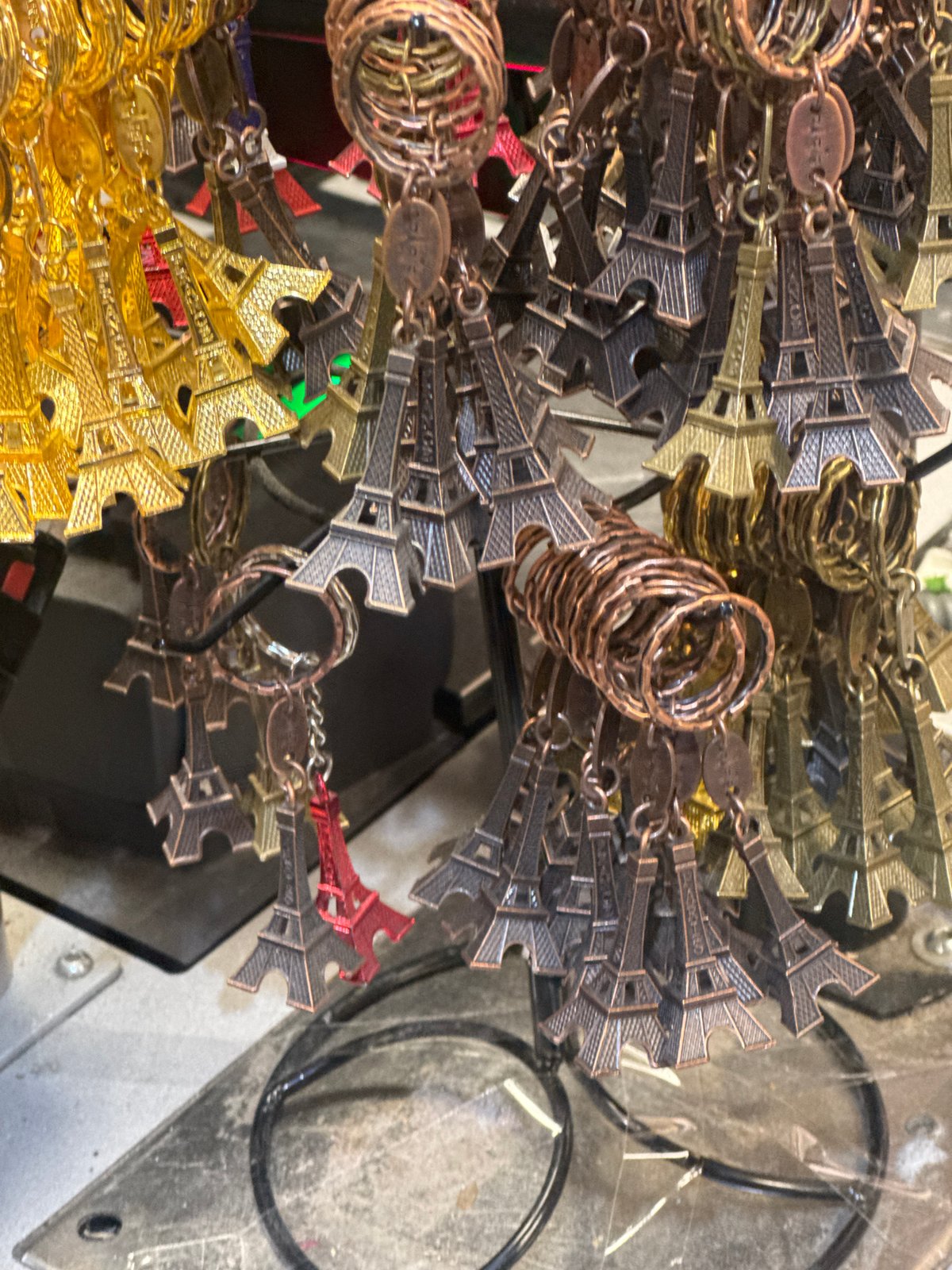 Gilded winged sculpture photographed atop Paris monument