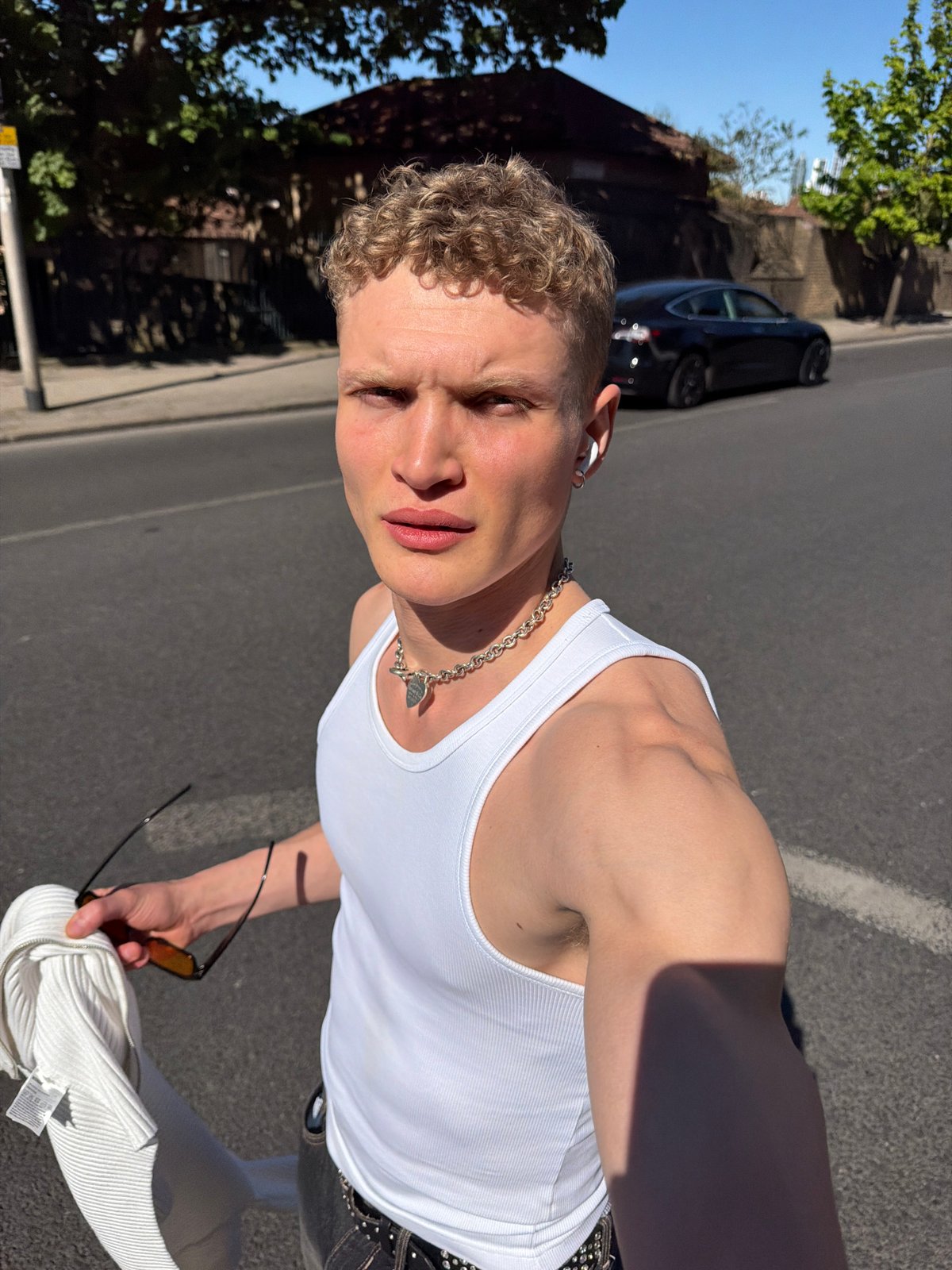 Young man photographed in bright London sunlight