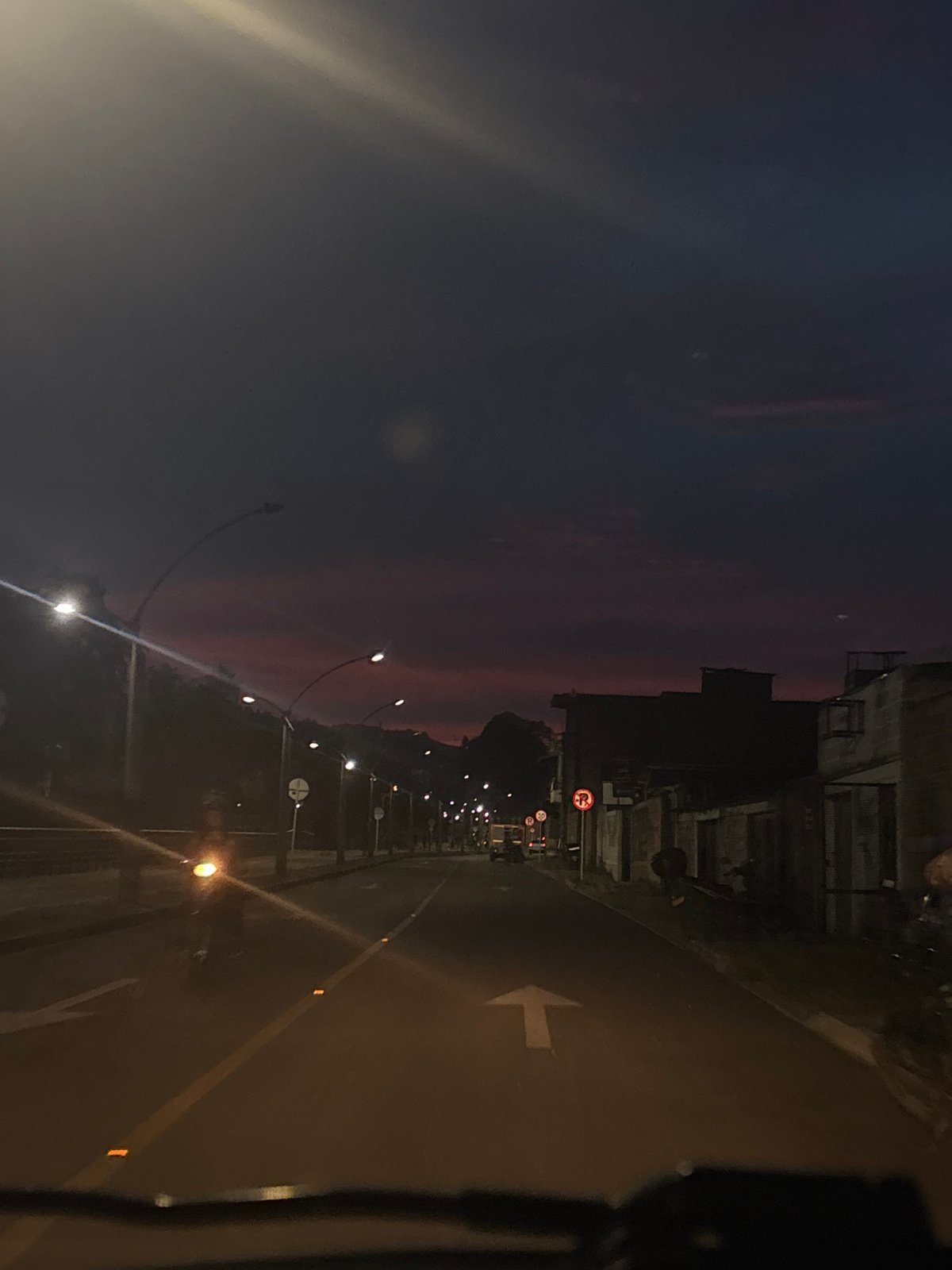Dusk street scene documented in Guarne, Colombia