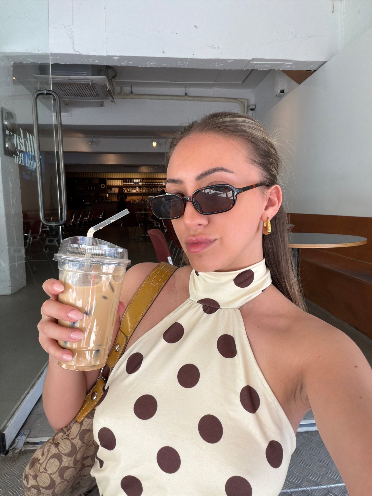 Woman with iced coffee spotted in Seoul early morning
