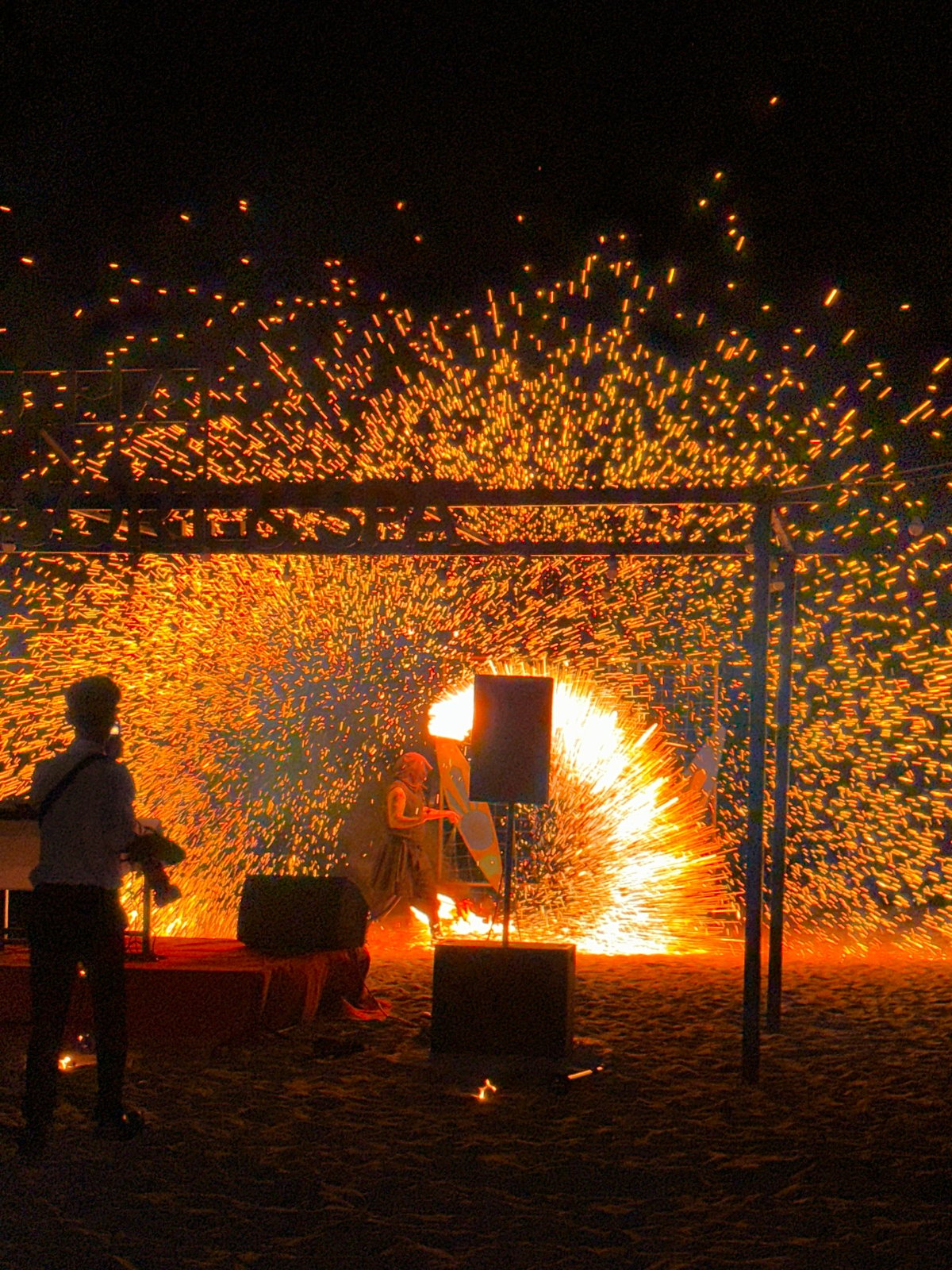 Fire dancers perform at Vietnam beach resort party