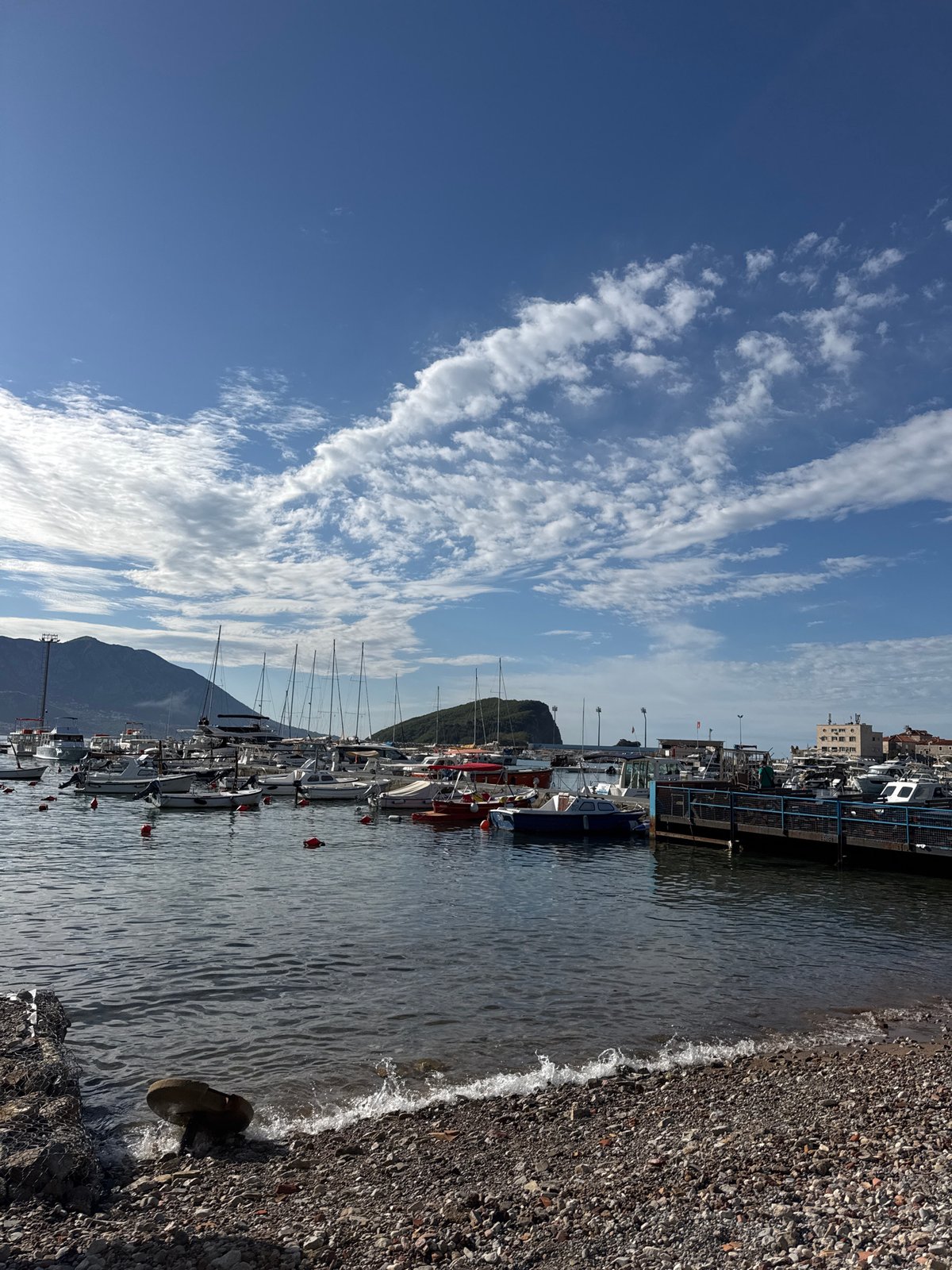 Early morning coastal scenes captured across Budva marina and beaches