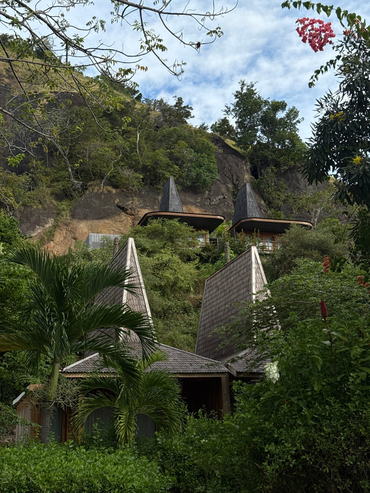 Indonesian hillside homes and poolside restaurant documented by witness