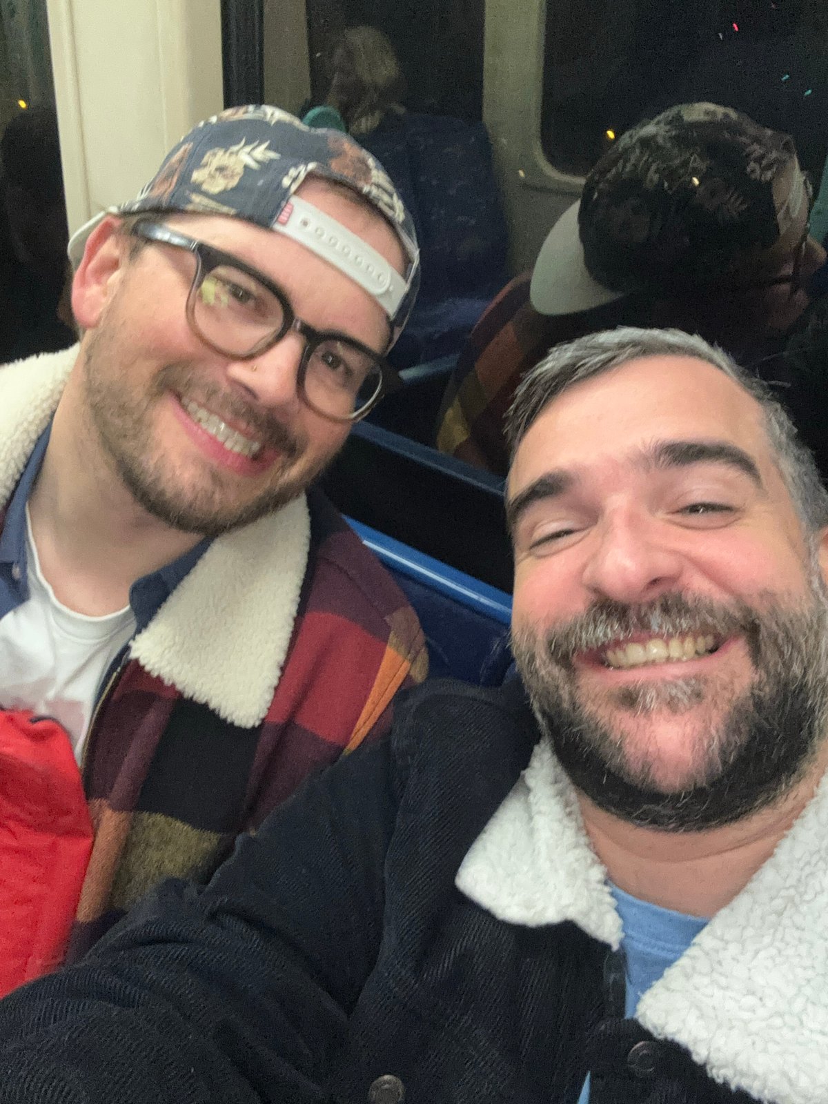 Two men take selfie together in London