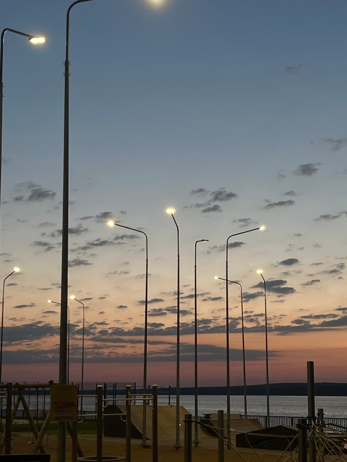 Spring sunset captured along Kama River waterfront in Chaikovsky, Russia
