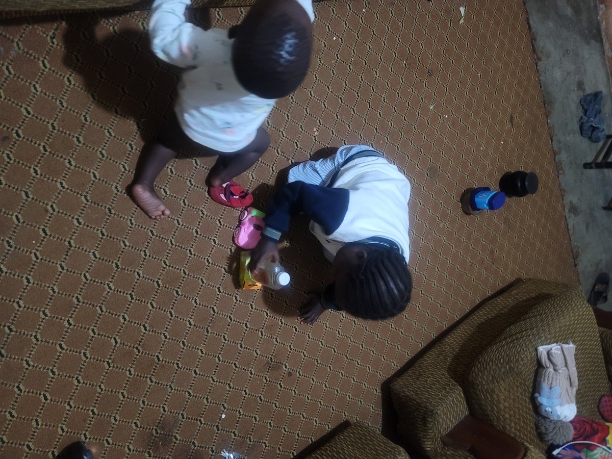 Children's quiet evening moments captured in home setting