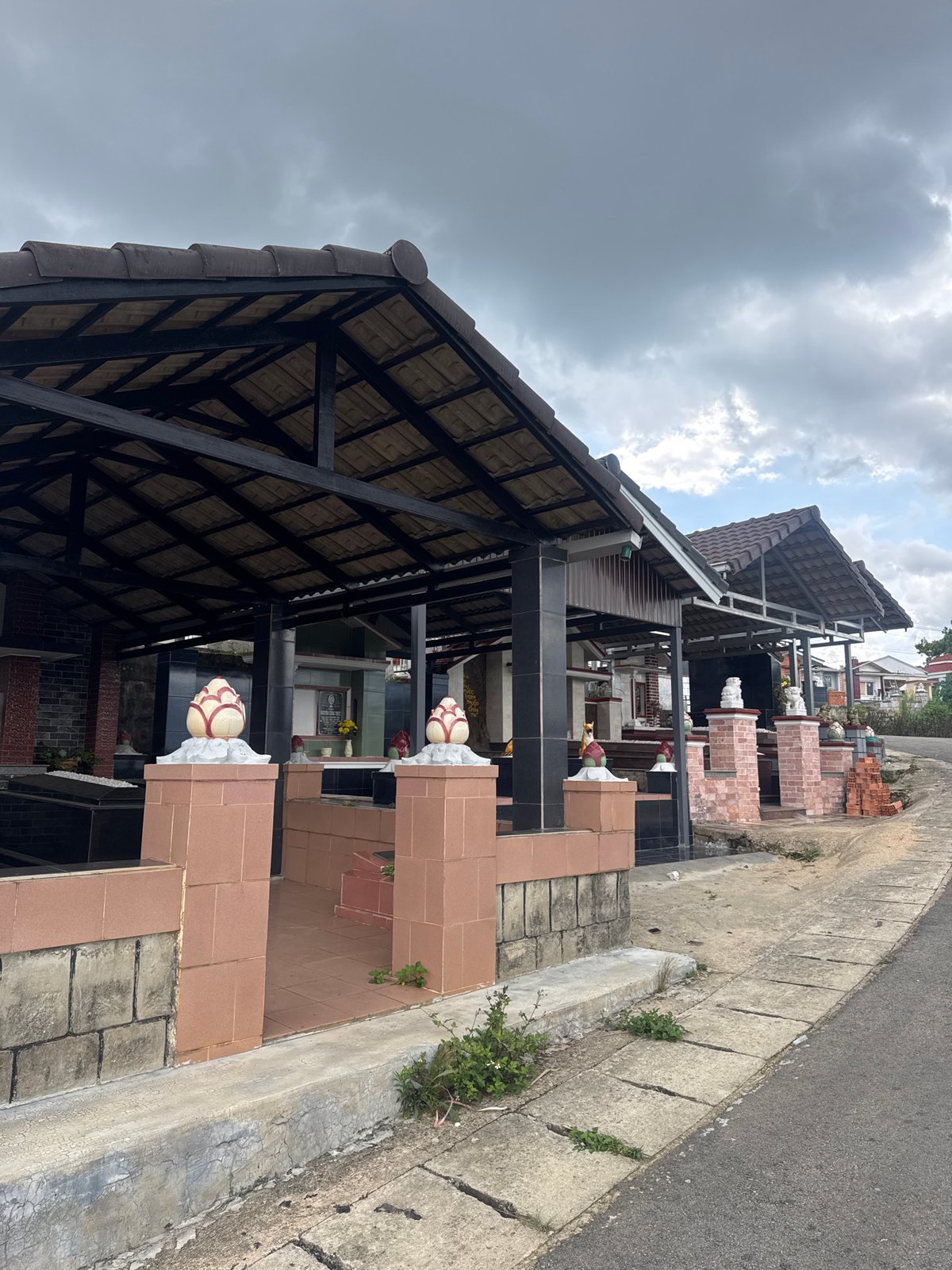 Morning documentation of ornate cemetery in Vietnamese highlands