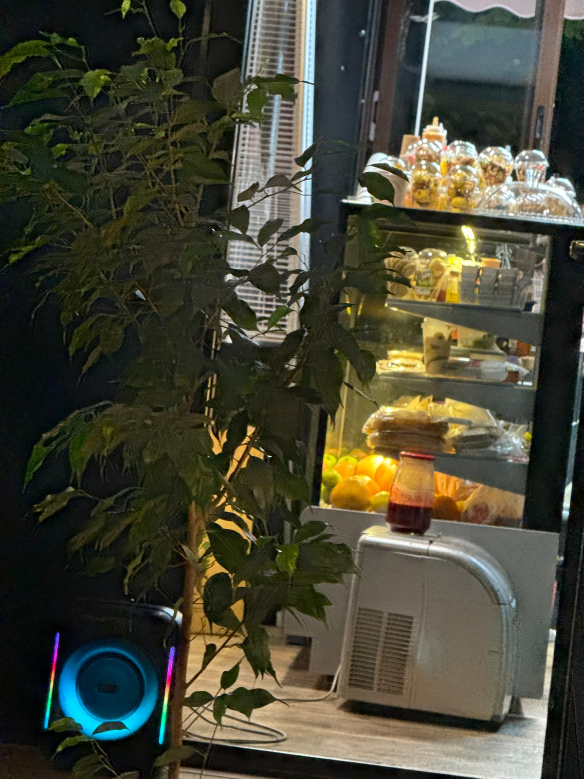 Dusk café stop and convenience store browse in Vladikavkaz