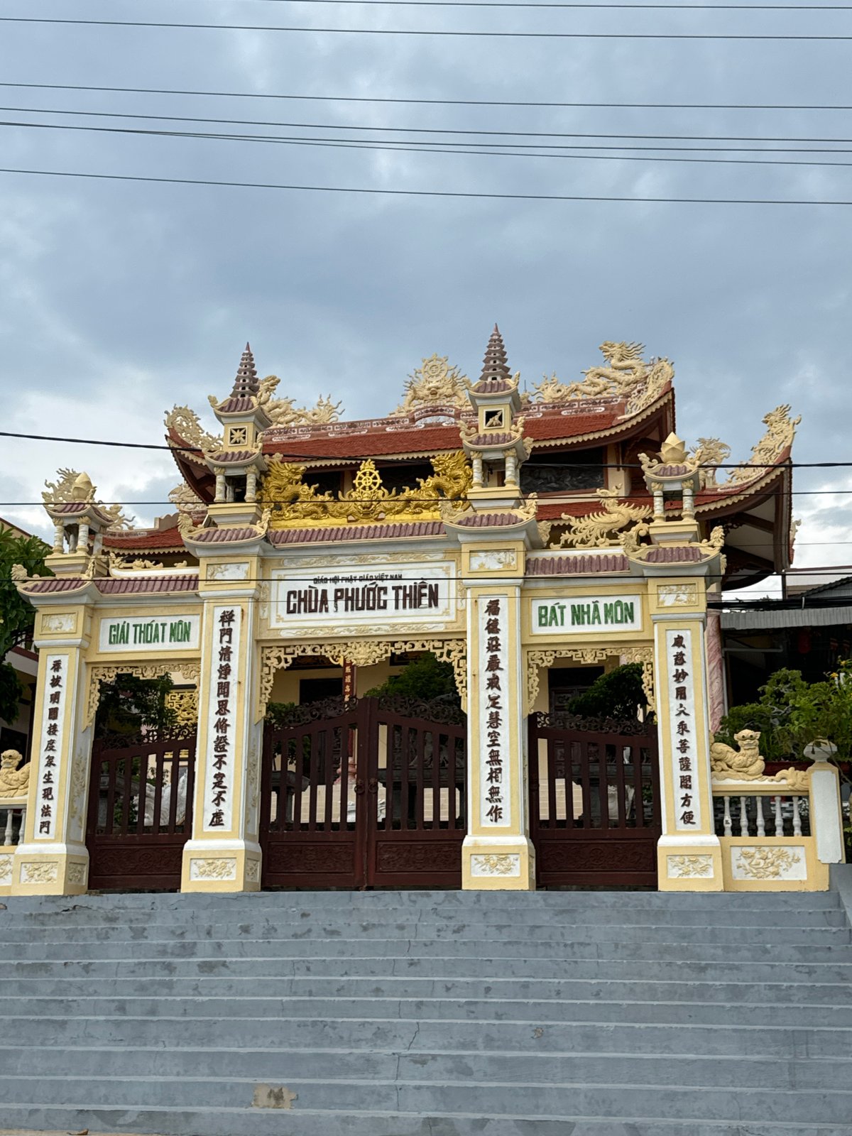 Motorcycle ride and temple stop in Phu Thuy Ward, Vietnam