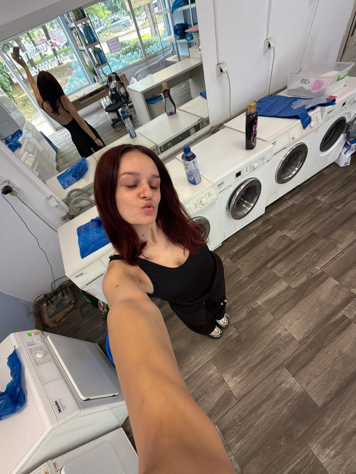 Selfie session at a Sofia laundromat, plus a handwritten log
