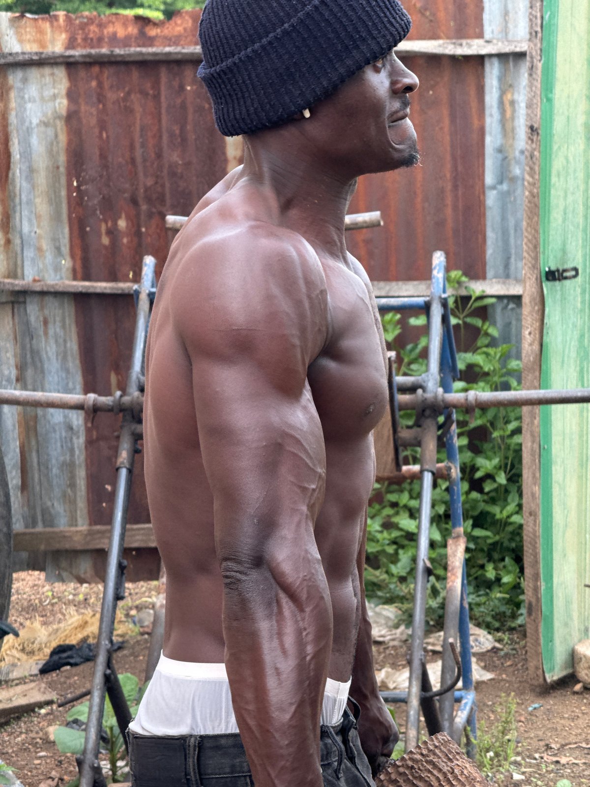 DIY outdoor gym session in a backyard in Akwanga, Nigeria
