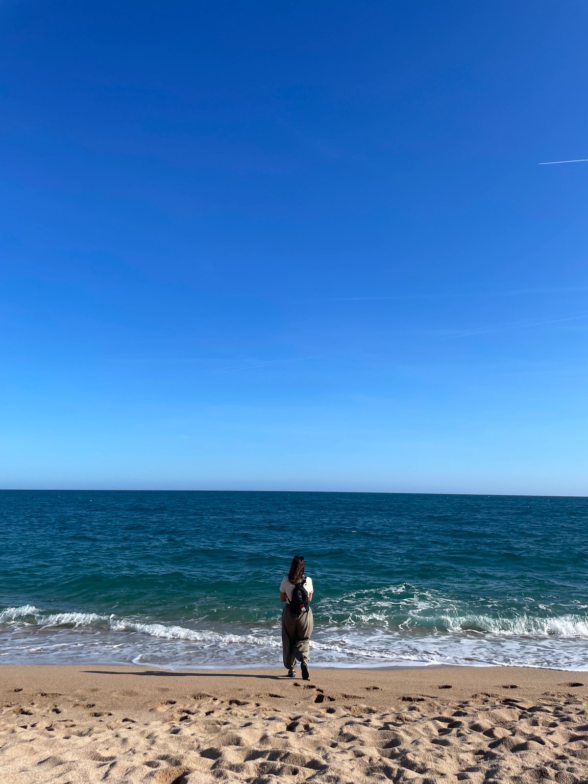 Sunny afternoon beach visit with gelato in Canet de Mar