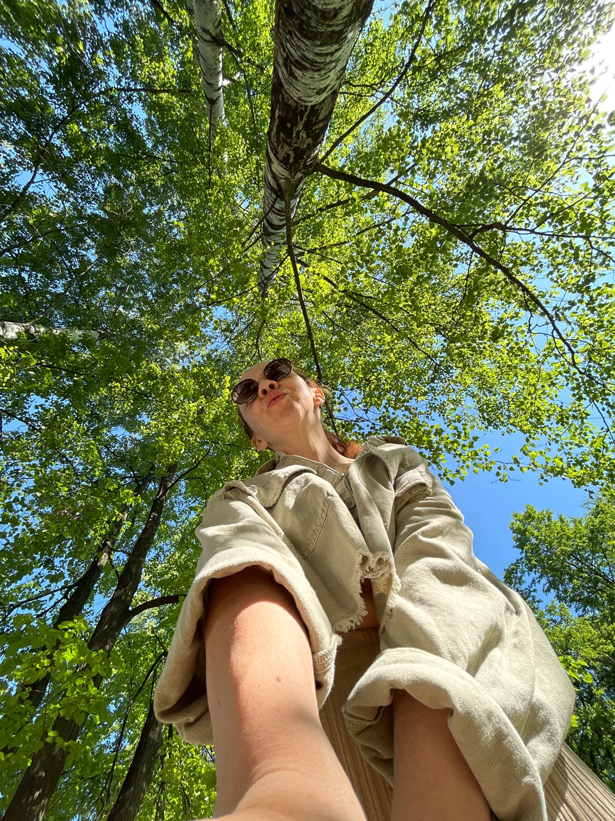 Person photographed outdoors amid spring foliage in Chaikovsky, Russia