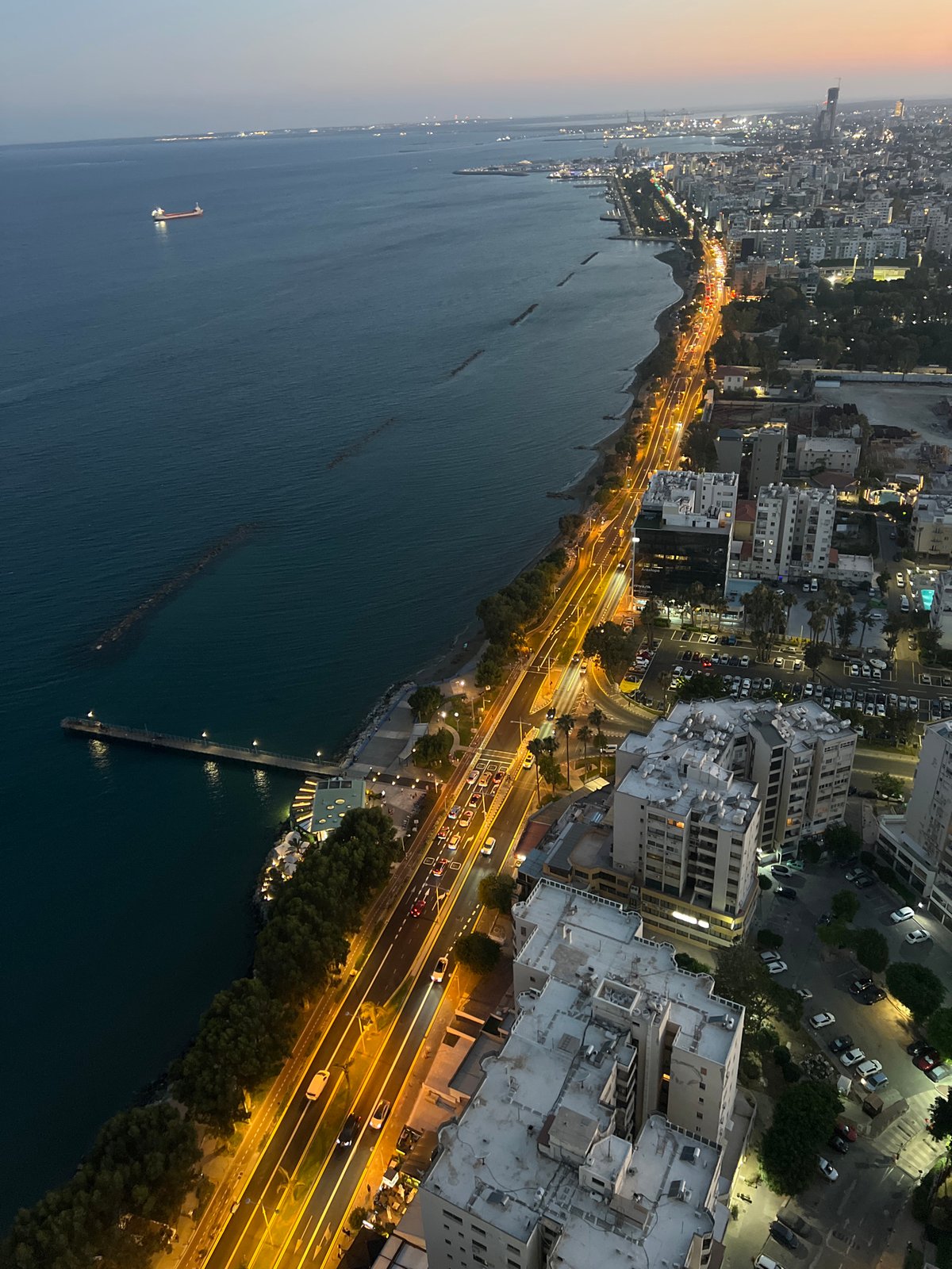 Limassol coastline glows at dusk from above