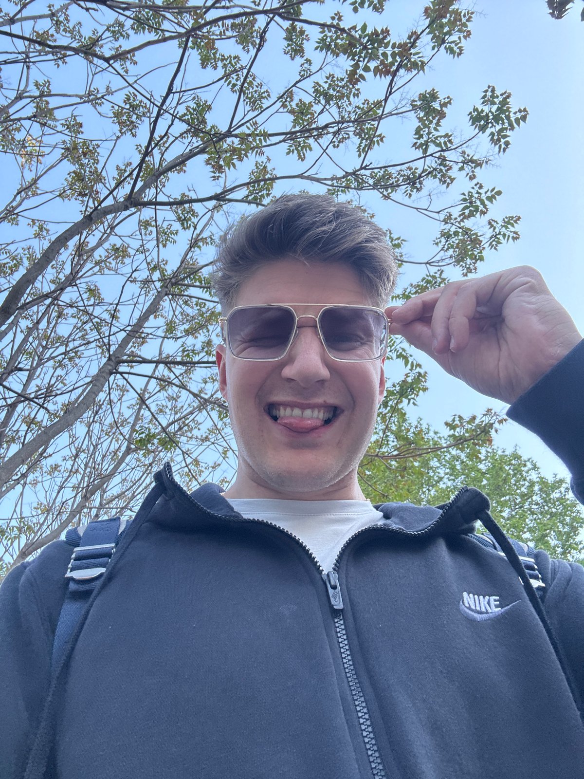 Man takes cheerful selfies on sunny afternoon in Plovdiv