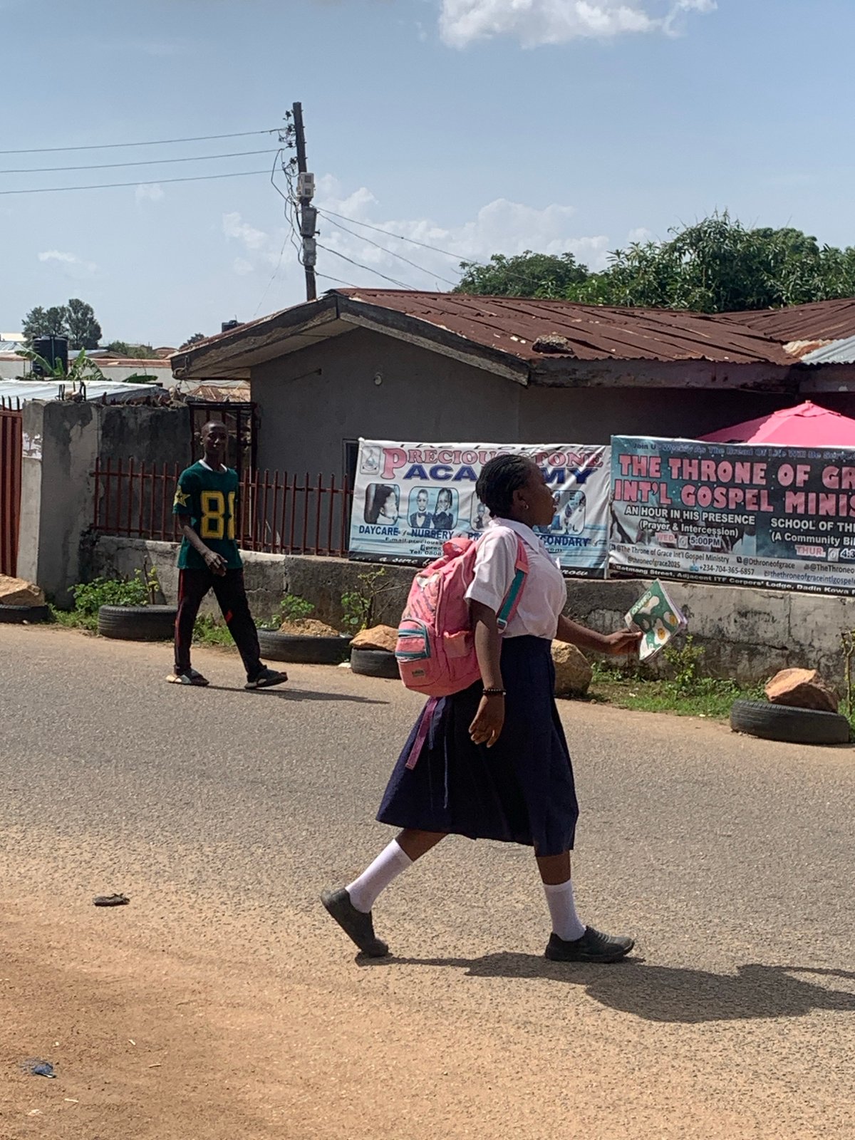 Daily life unfolds across Jos, Nigeria streets and homes