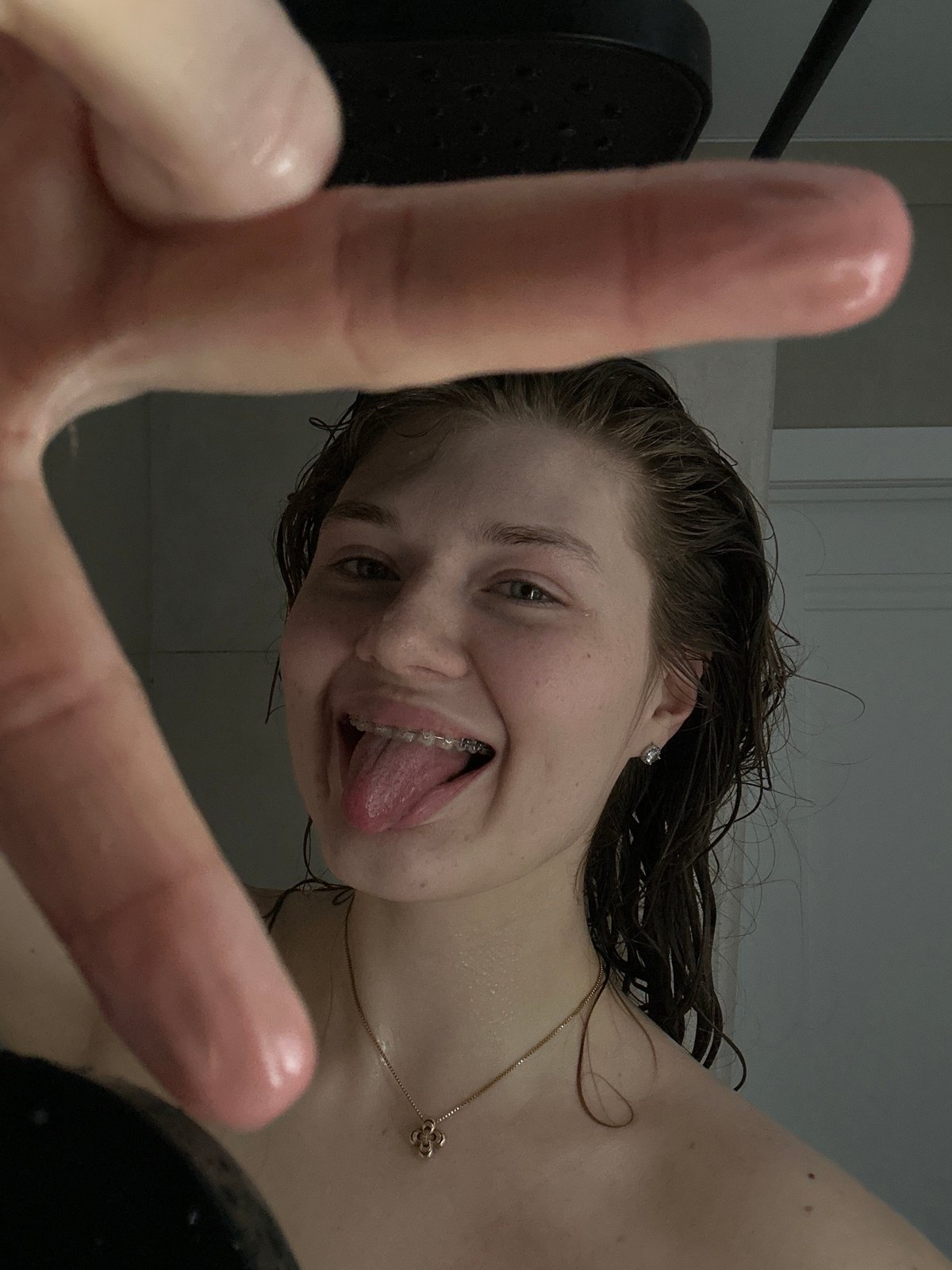 Person documents shower routine in Kazan apartment