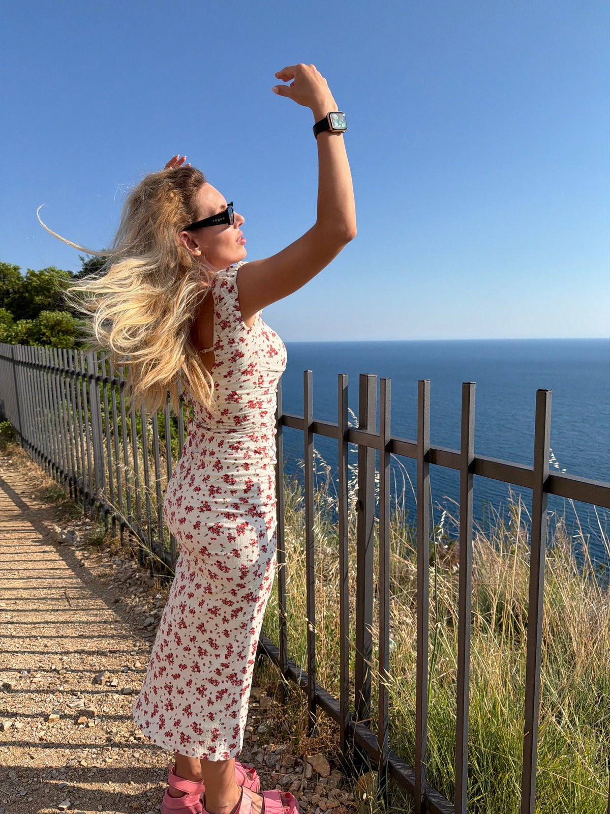 Woman explores Montenegro's Adriatic coast during afternoon sightseeing
