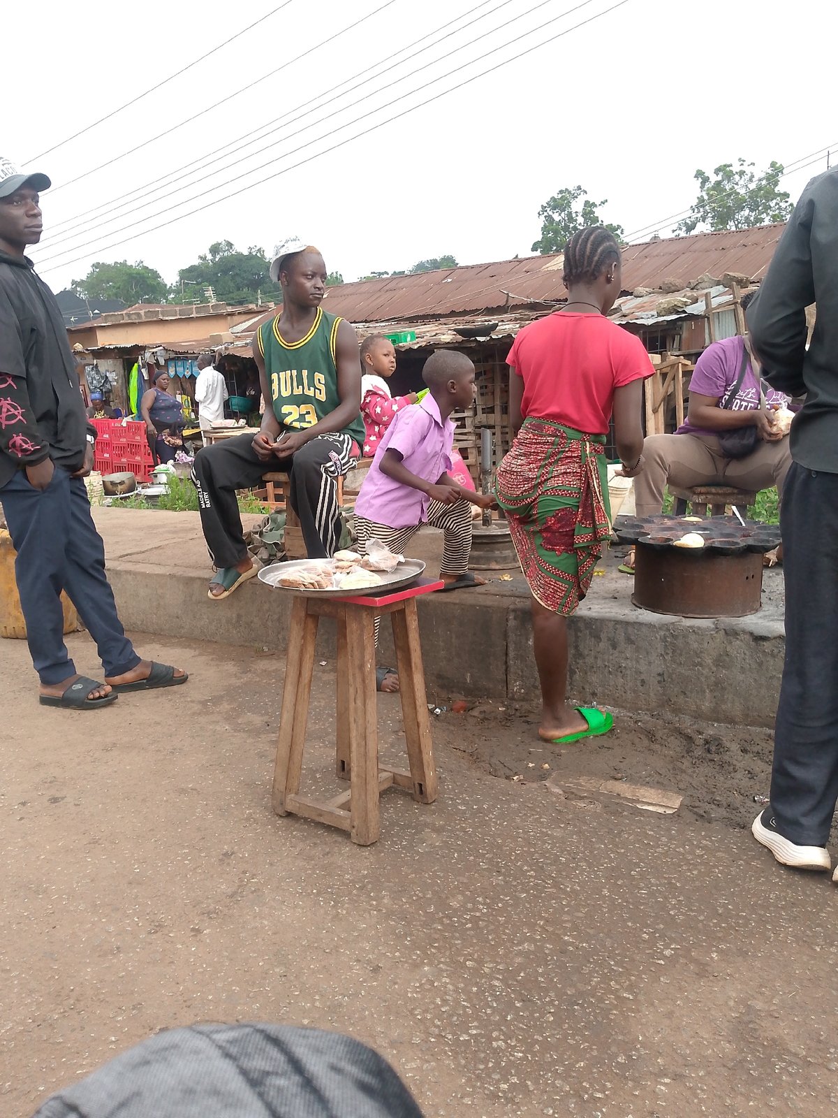 Morning street life documented in Bukuru, Nigeria neighborhood