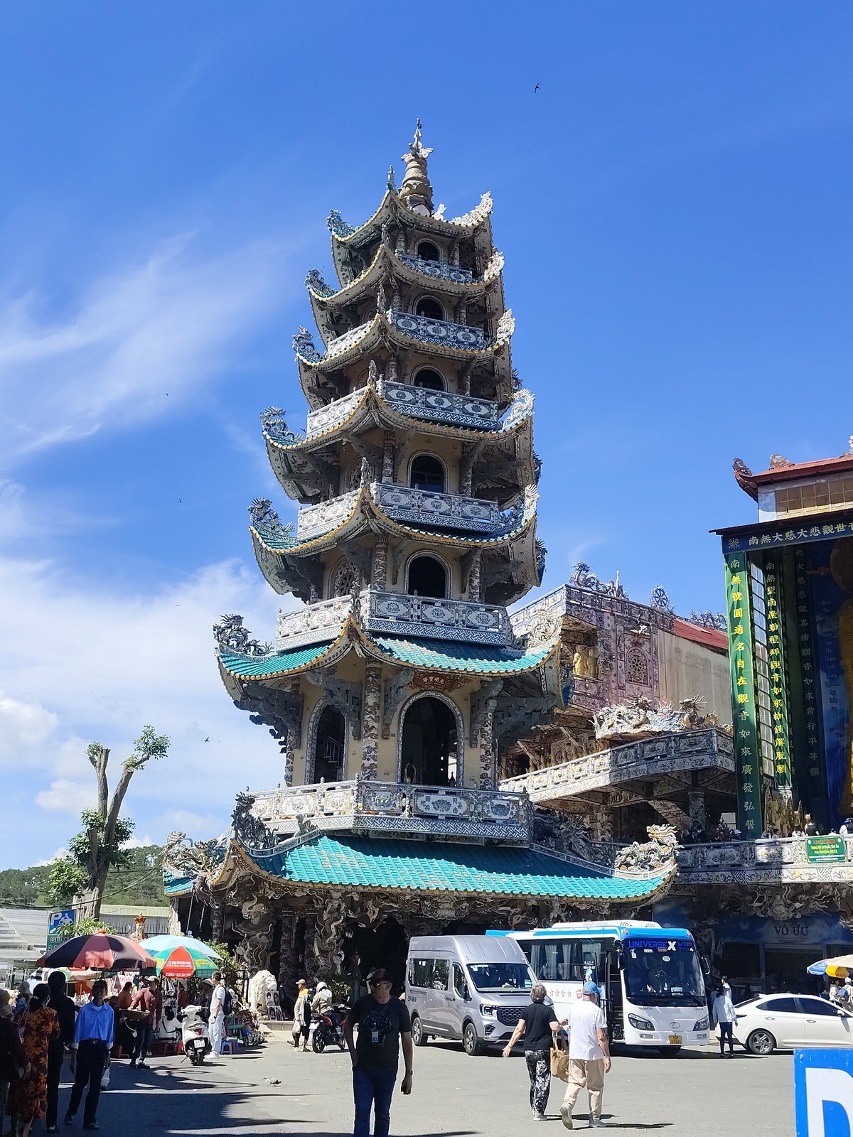 Inside and outside a mosaic-covered Vietnamese Buddhist pagoda