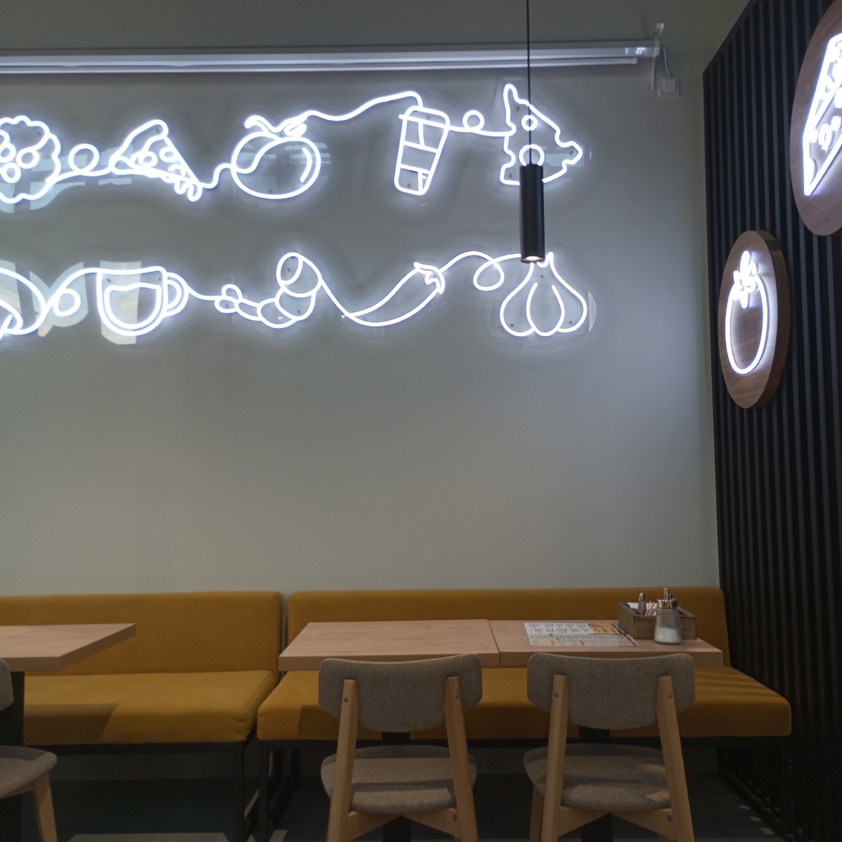 Indoor scenes captured: restaurant, woman on couch, child playing