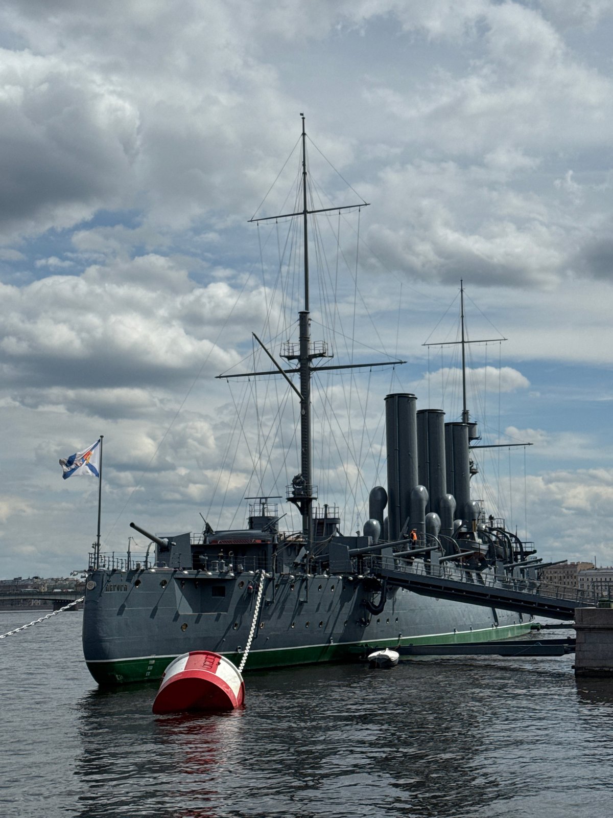 Naval personnel march near Aurora cruiser in Saint Petersburg