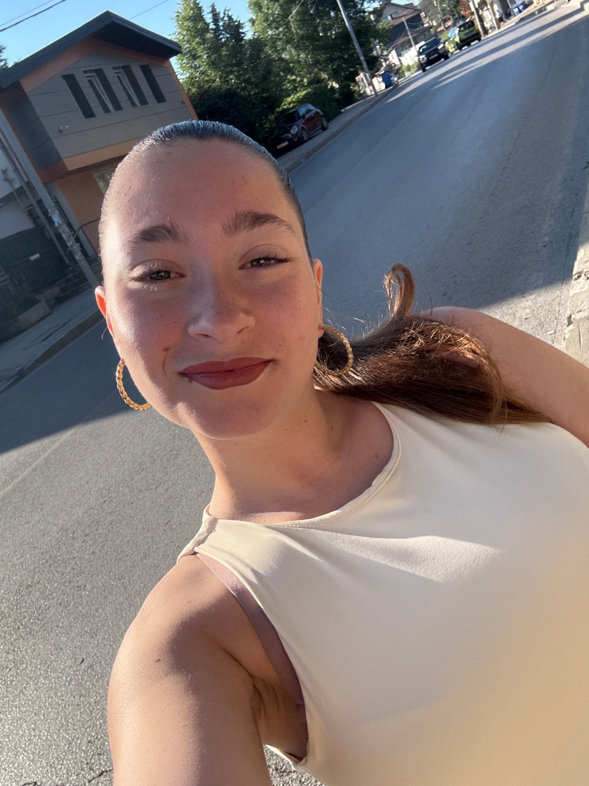 Woman Takes Morning Selfies in Sofia Bulgaria Neighborhood