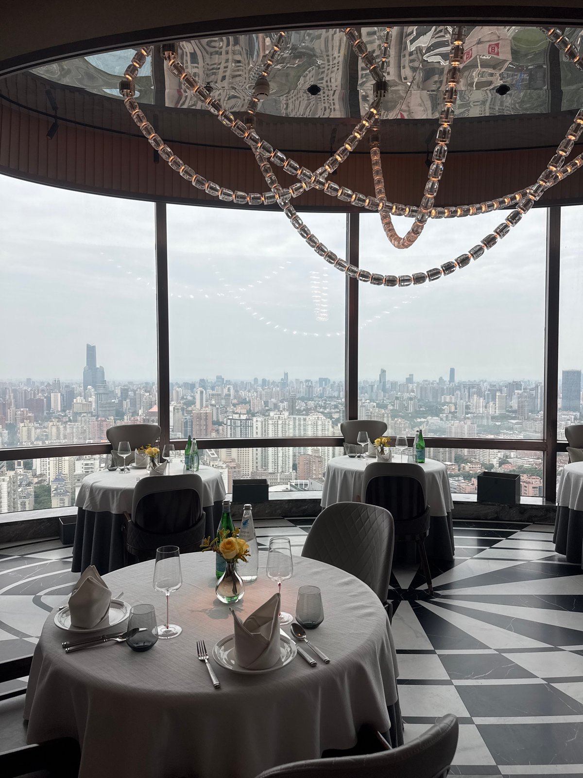 High-end Shanghai restaurant interior captured with skyline views