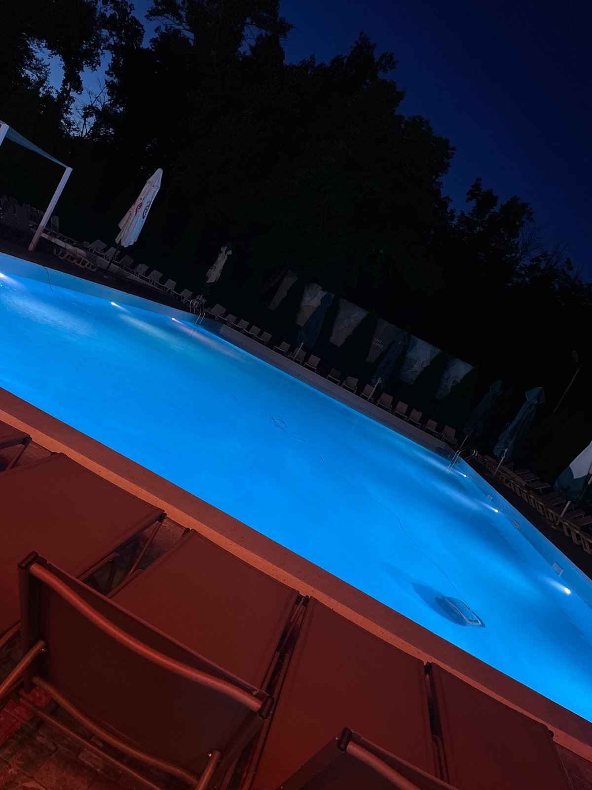 Summer evening at a resort pool in Vadul lui Voda