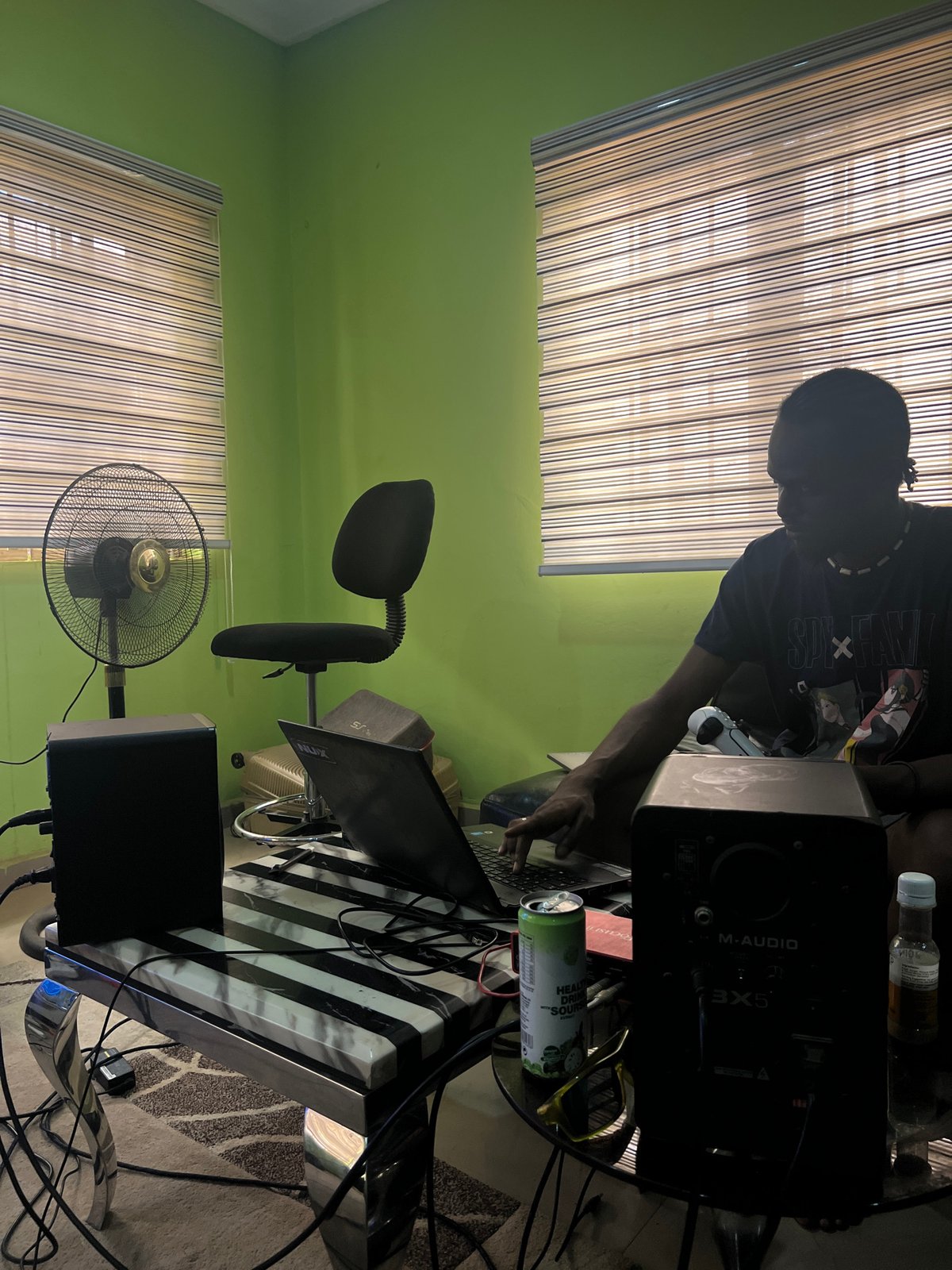 Music producer records in home studio in Abuja