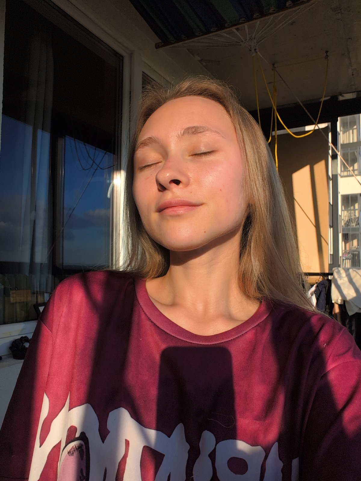 Balcony afternoon in rural Russia, golden light and quiet views