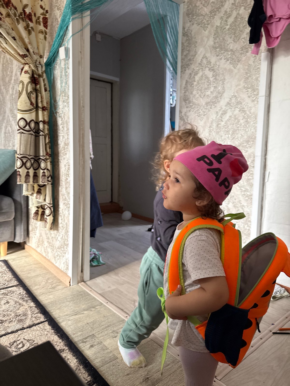Child photographed at home in Уральское, Russia