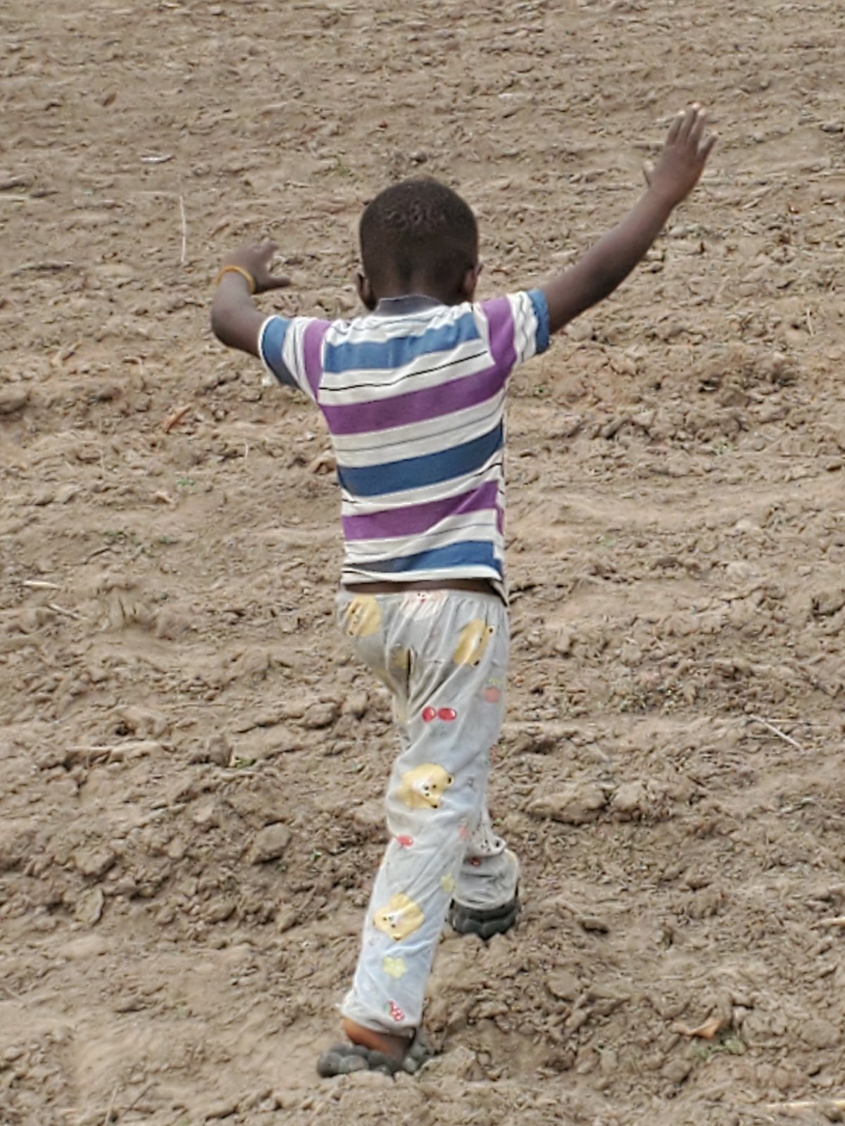 Child's morning activities documented in rural Mararaba, Nigeria