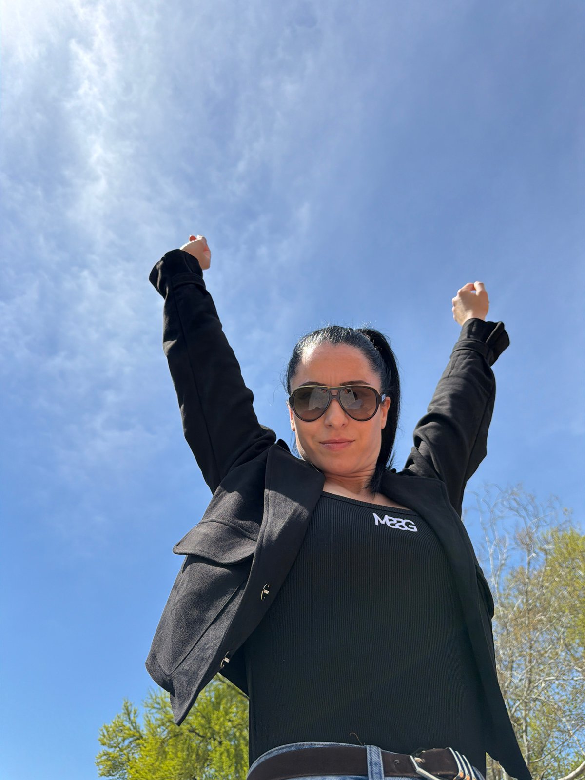 Woman photographs sunny morning visit to Pleven parks and landmarks