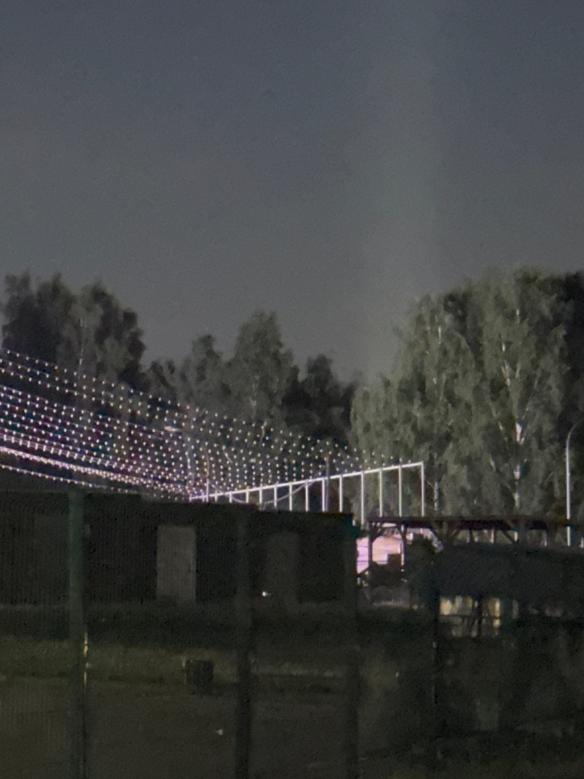 Nighttime documentation of illuminated Izhevsk recreational district captured