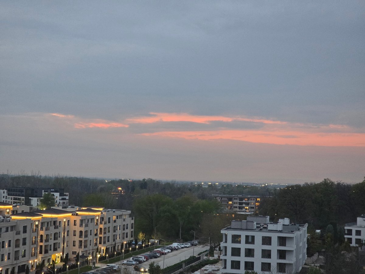 Twilight residential view and toy device photographed minutes apart