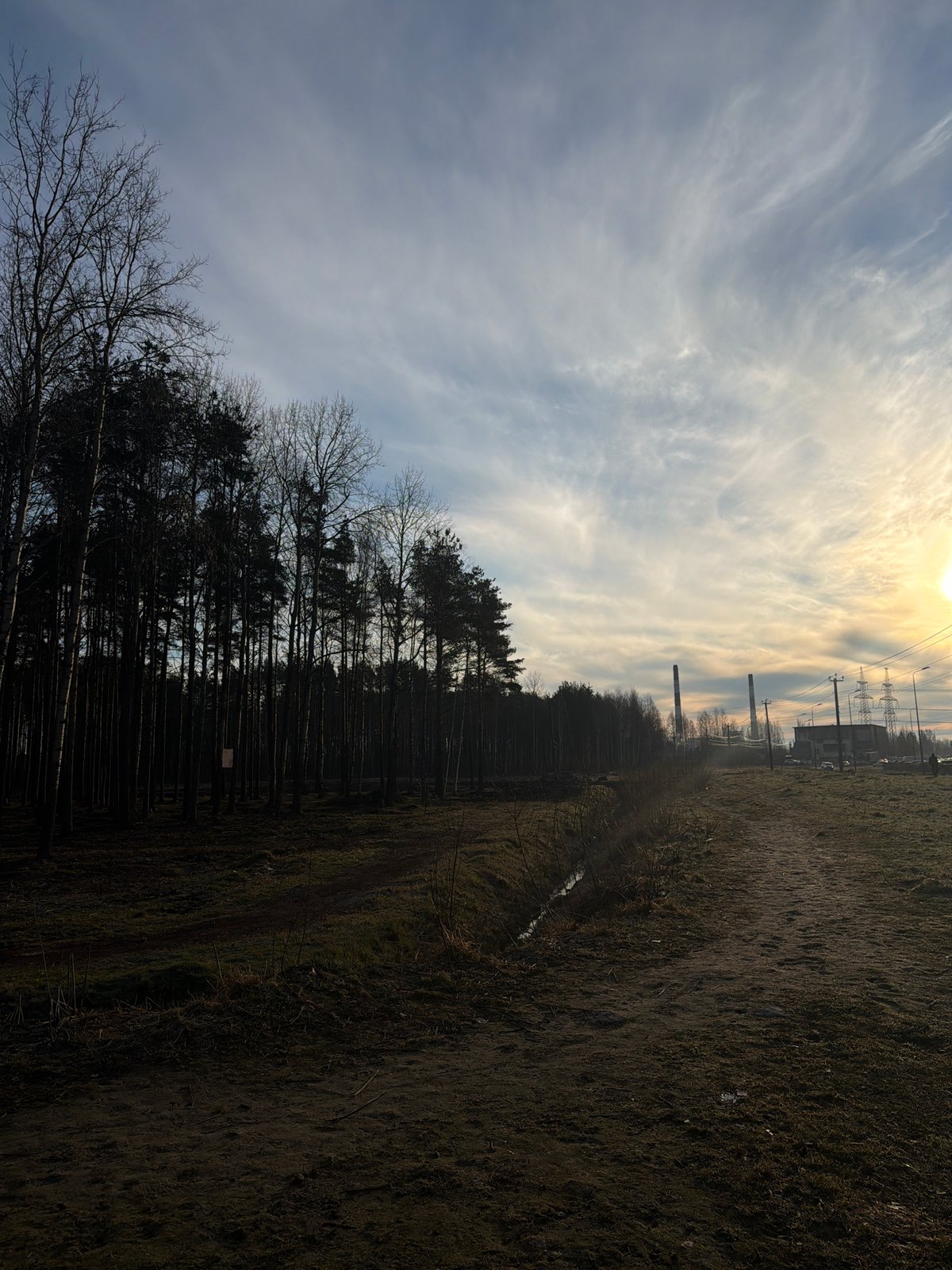 Industrial landscape with clouds observed in Murino, Russia