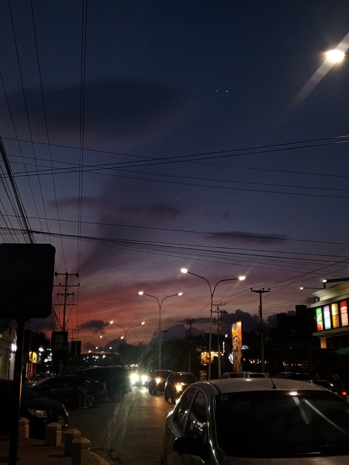 Twilight transition documented in Pampatar, Venezuela street scenes