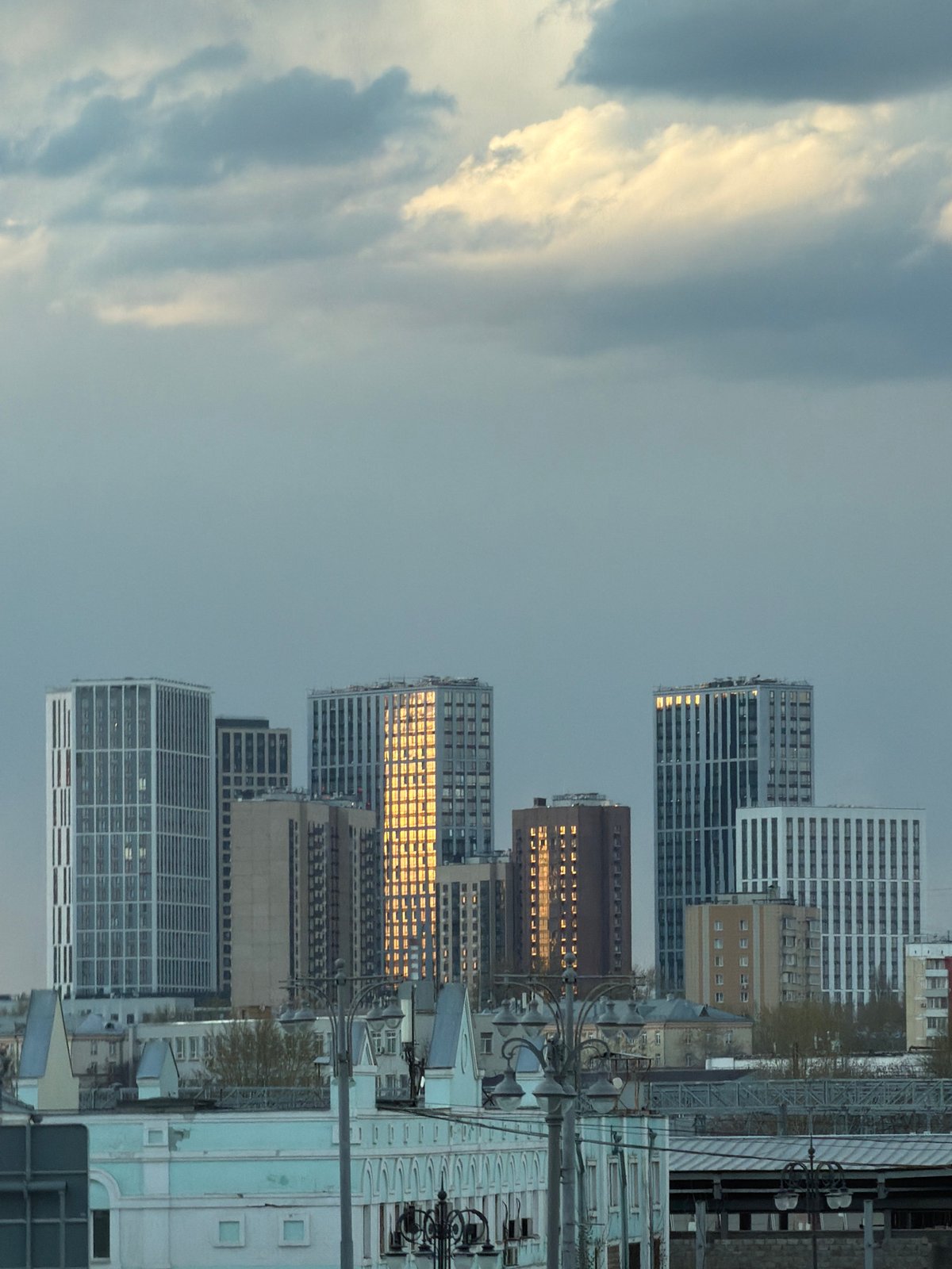 Moscow skyline and Ostankino Tower observed under dramatic clouds