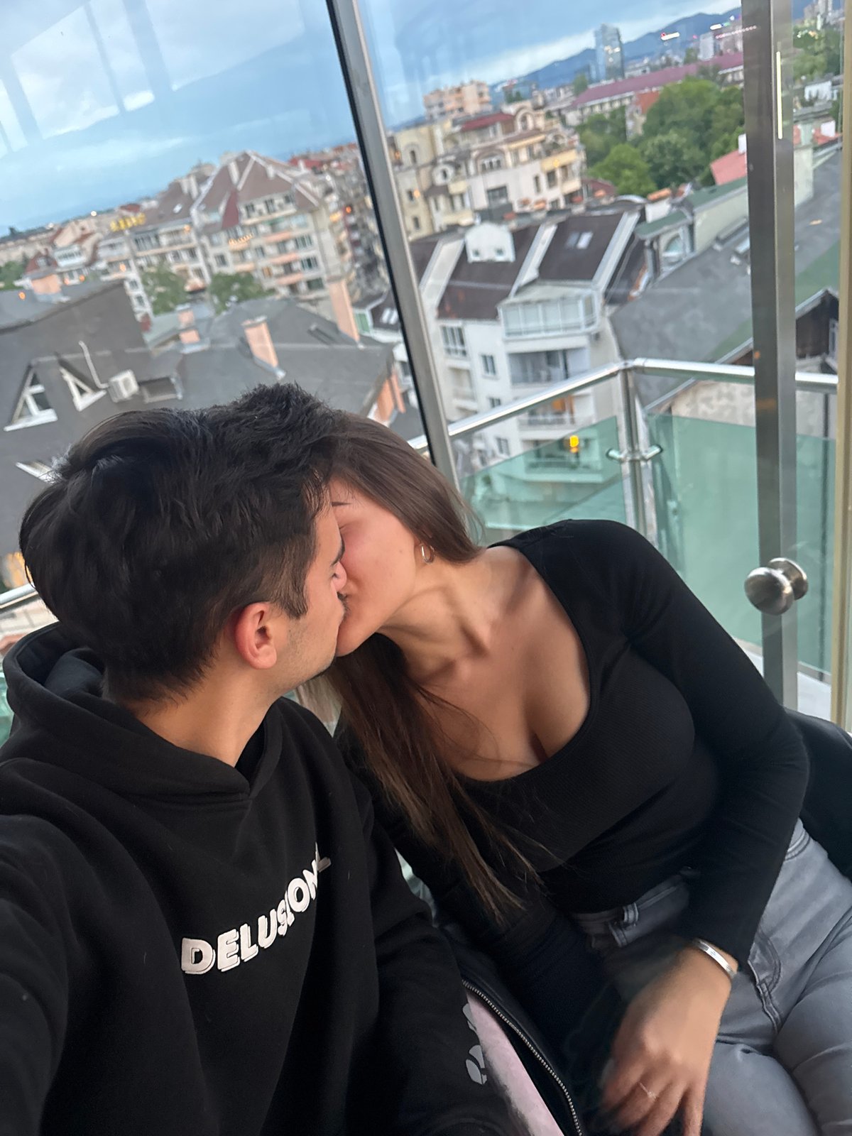 Couple shares intimate moments in Sofia high-rise building