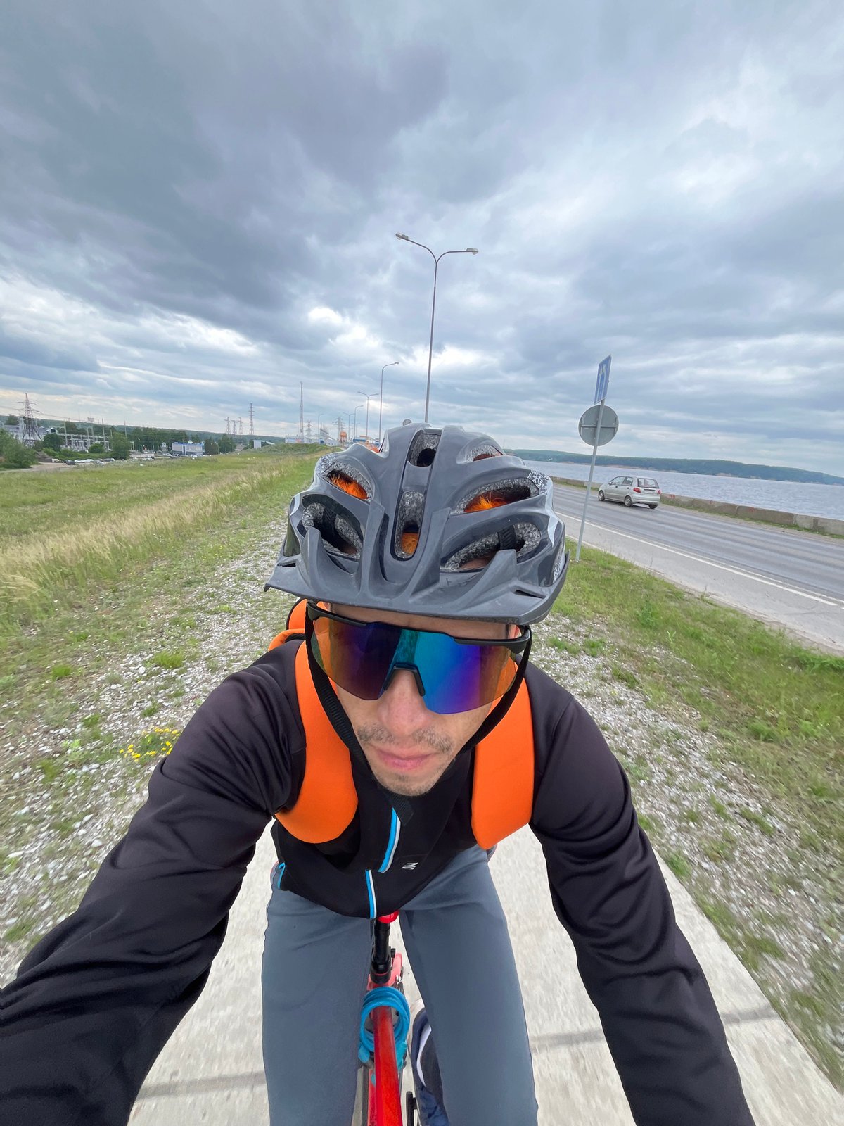 Cyclist documents morning ride along Kama River in Chaikovsky