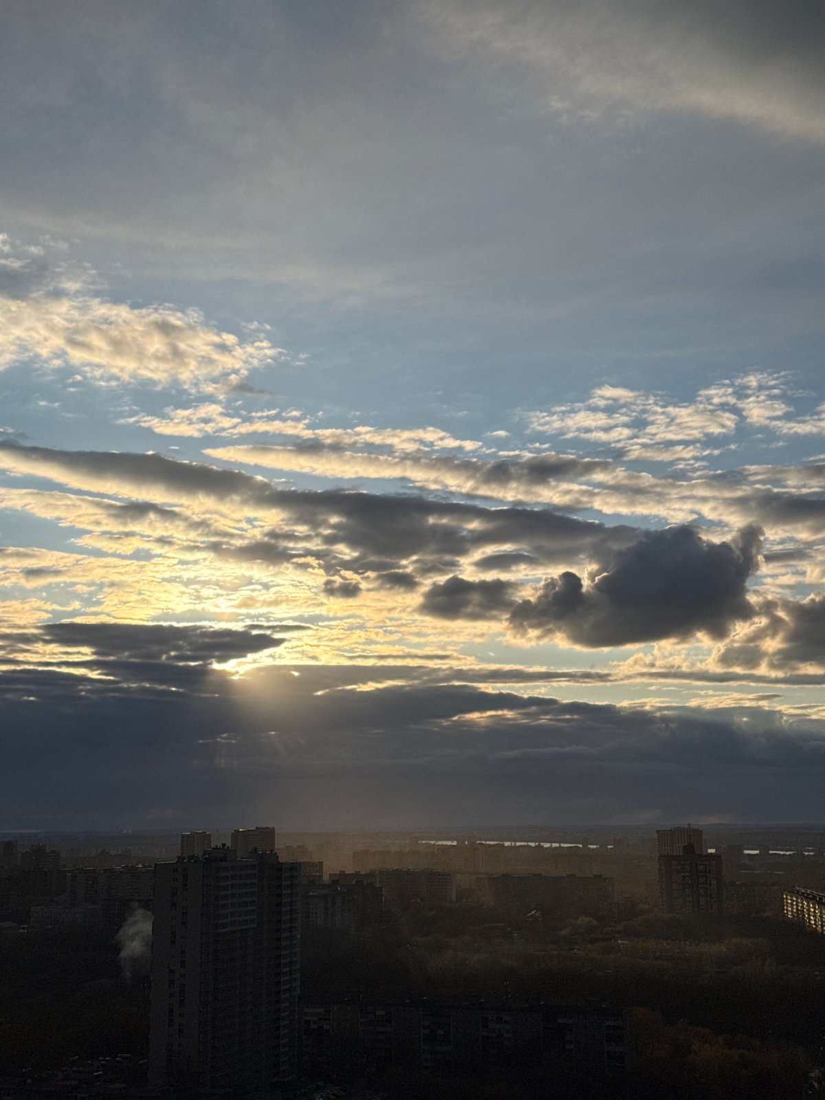 Dramatic sunset sky captured over Perm cityscape