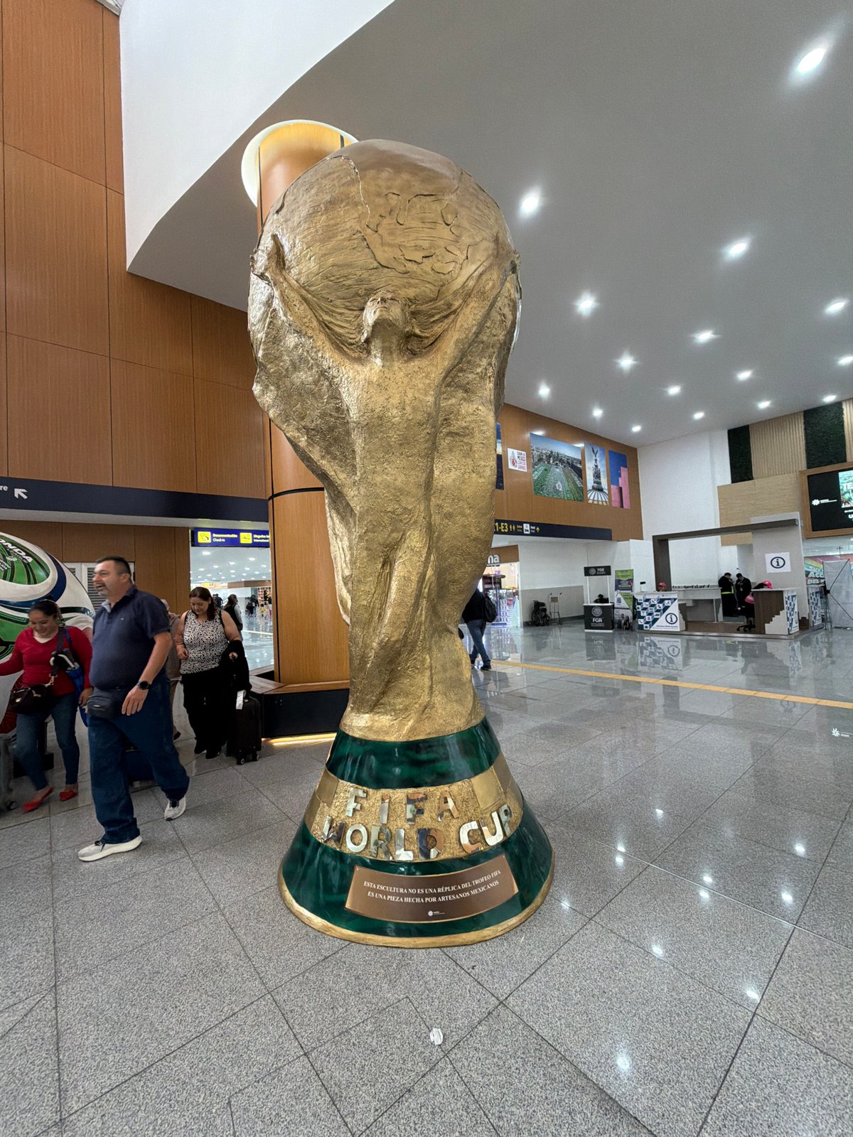 FIFA World Cup trophy replica displayed in Mexico City building