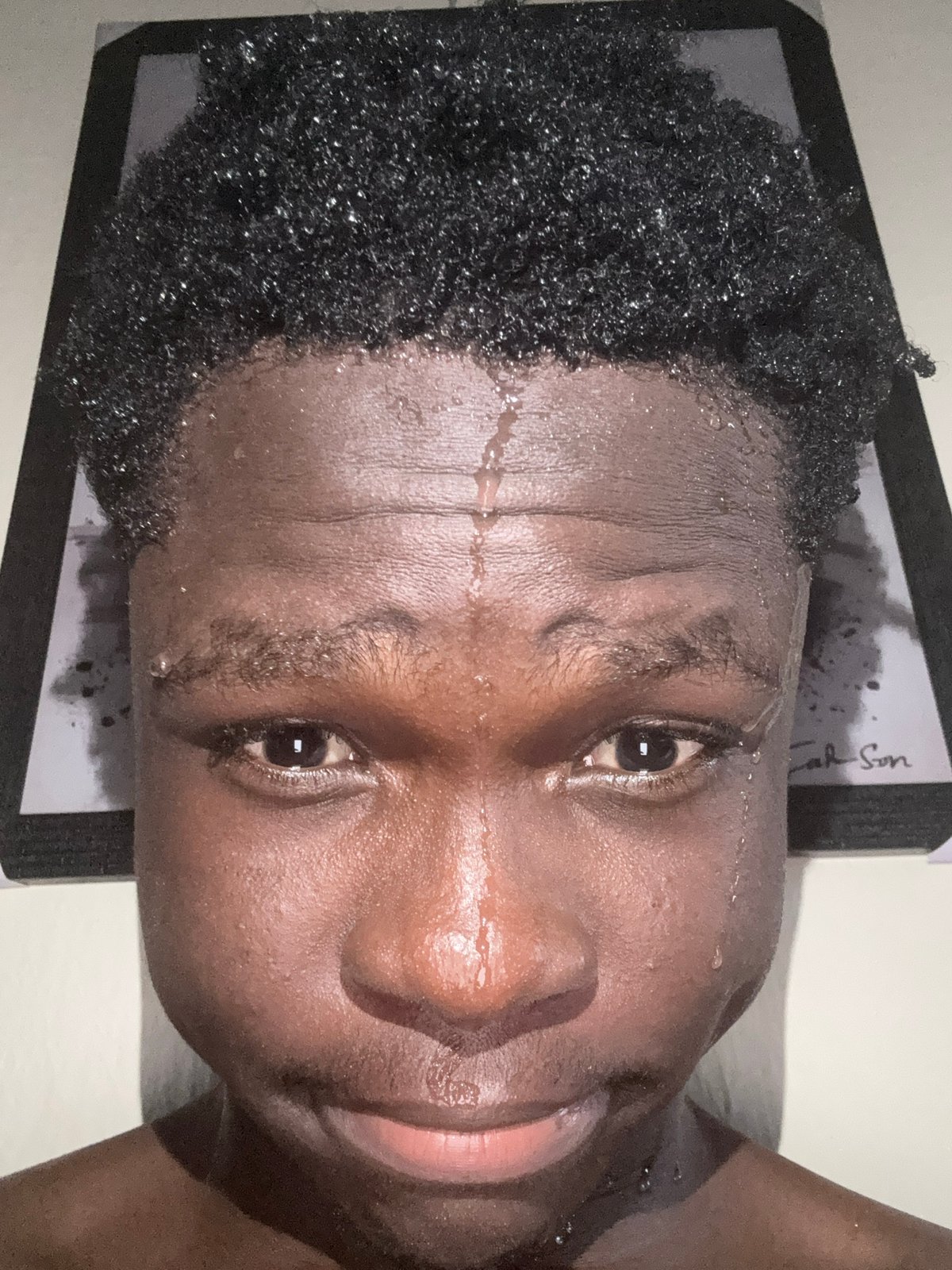Young man documents daily life through selfies in Ihiagwa, Nigeria