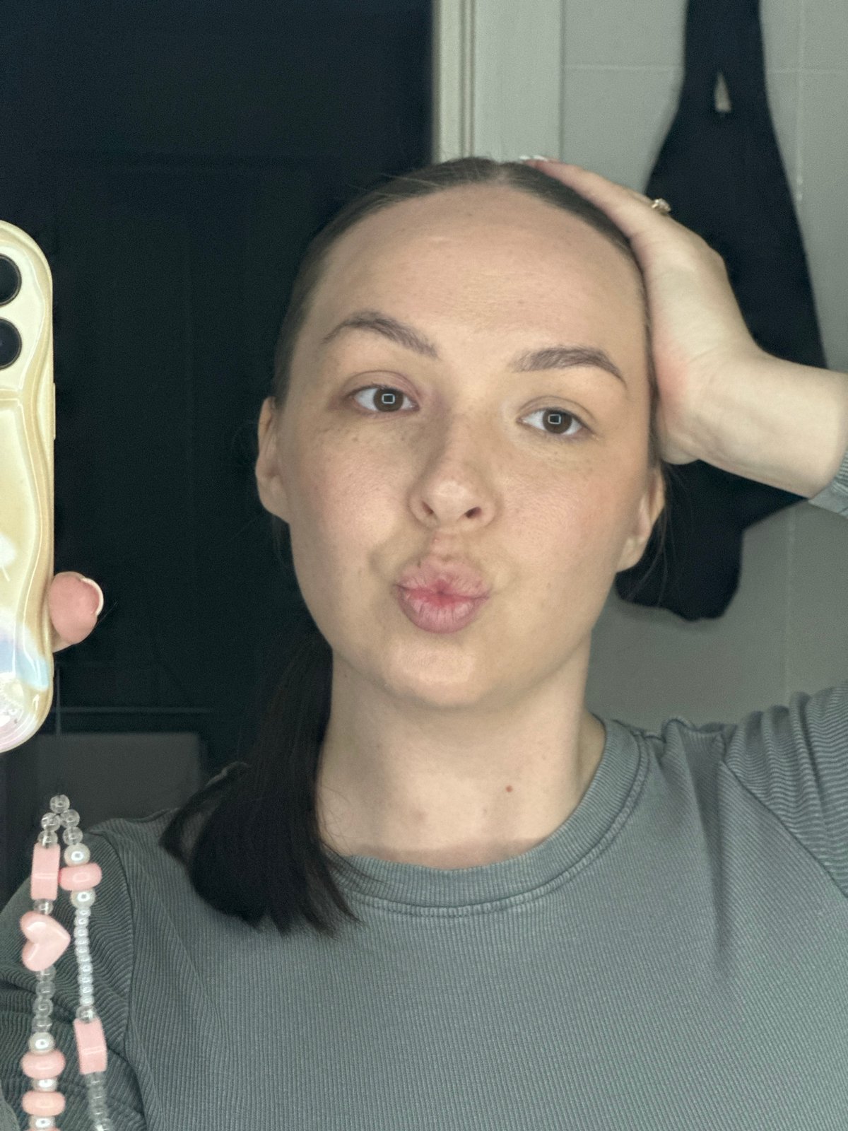 Woman takes selfies at sunset in Chaikovsky, Russia