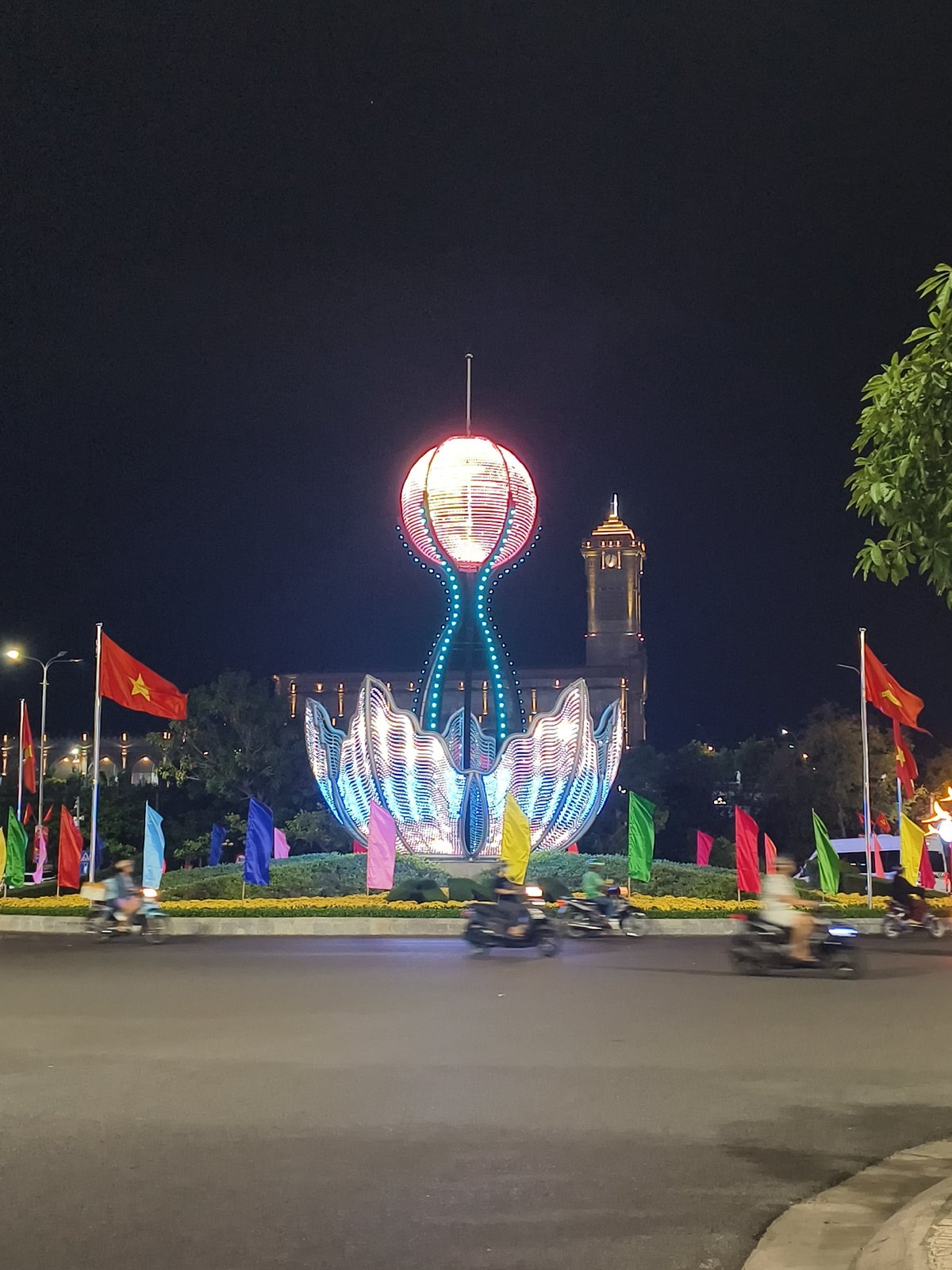 Illuminated lotus sculpture observed in Nha Trang traffic circle