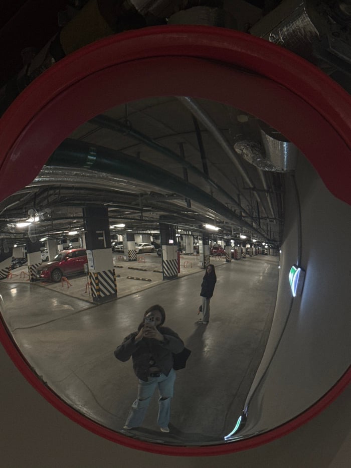Underground parking garage reflected in fisheye mirror in Moscow