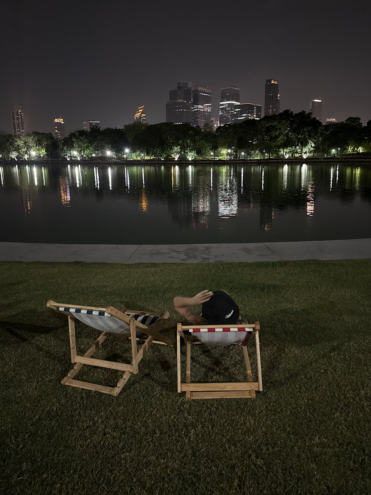 Bangkok witness captures city skyline, spirit house, shopping mall