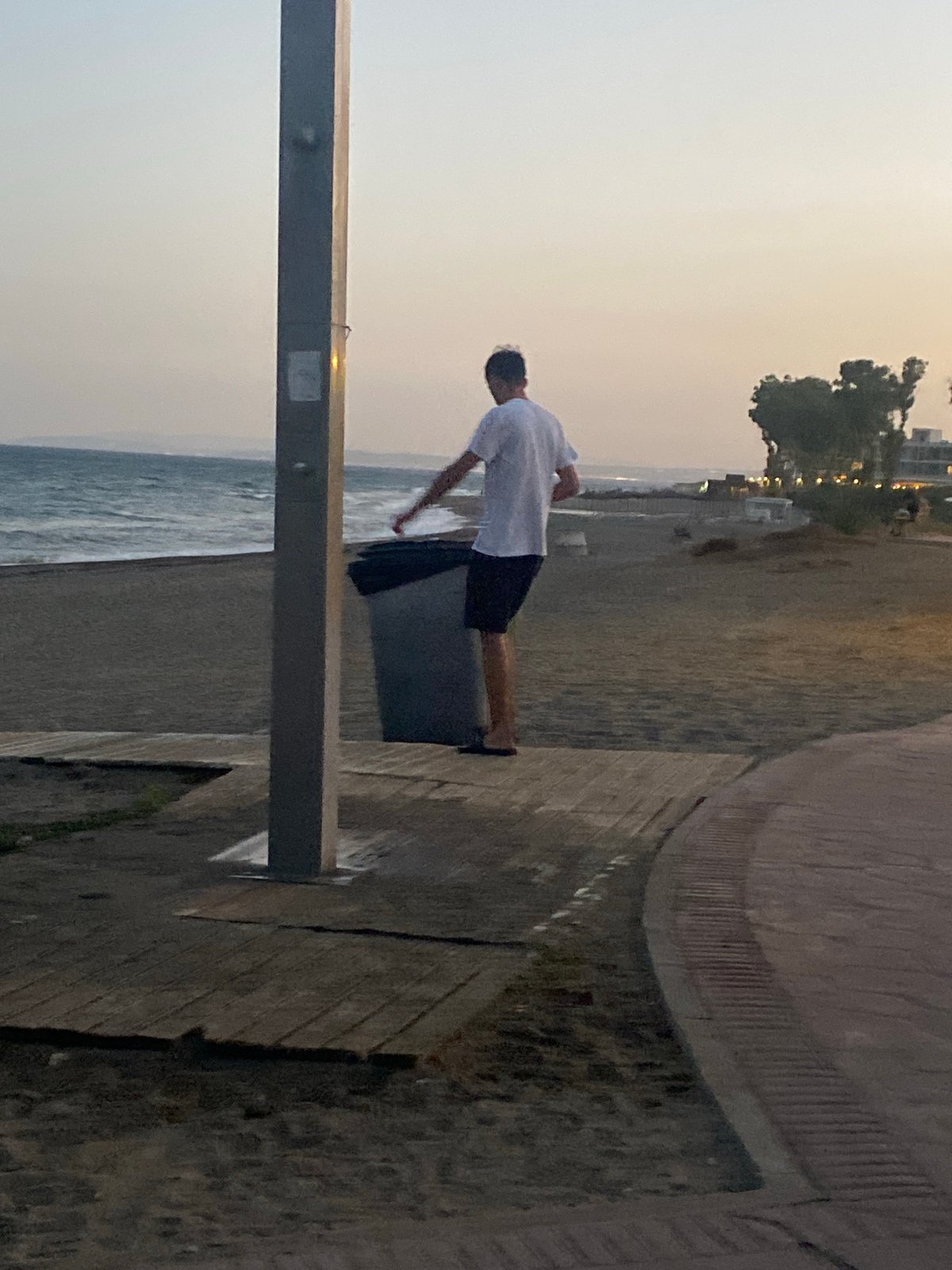 Evening activity along the Estepona coastal promenade at dusk