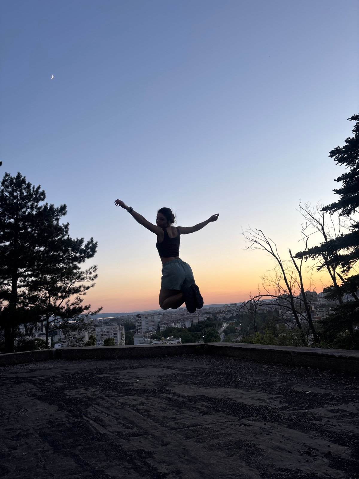 Rooftop fitness and golden-hour photos over Varna at sunset